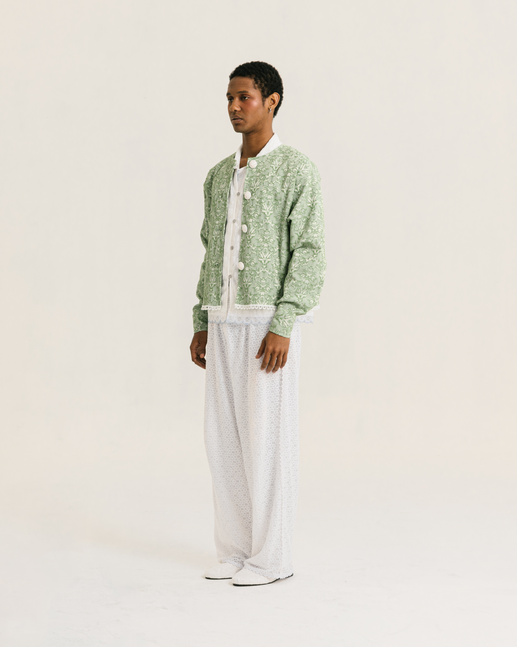 Image of Agatha Jacket Green, a relaxed fit jacket with a charming neckline, made from vintage jacquard fabric.