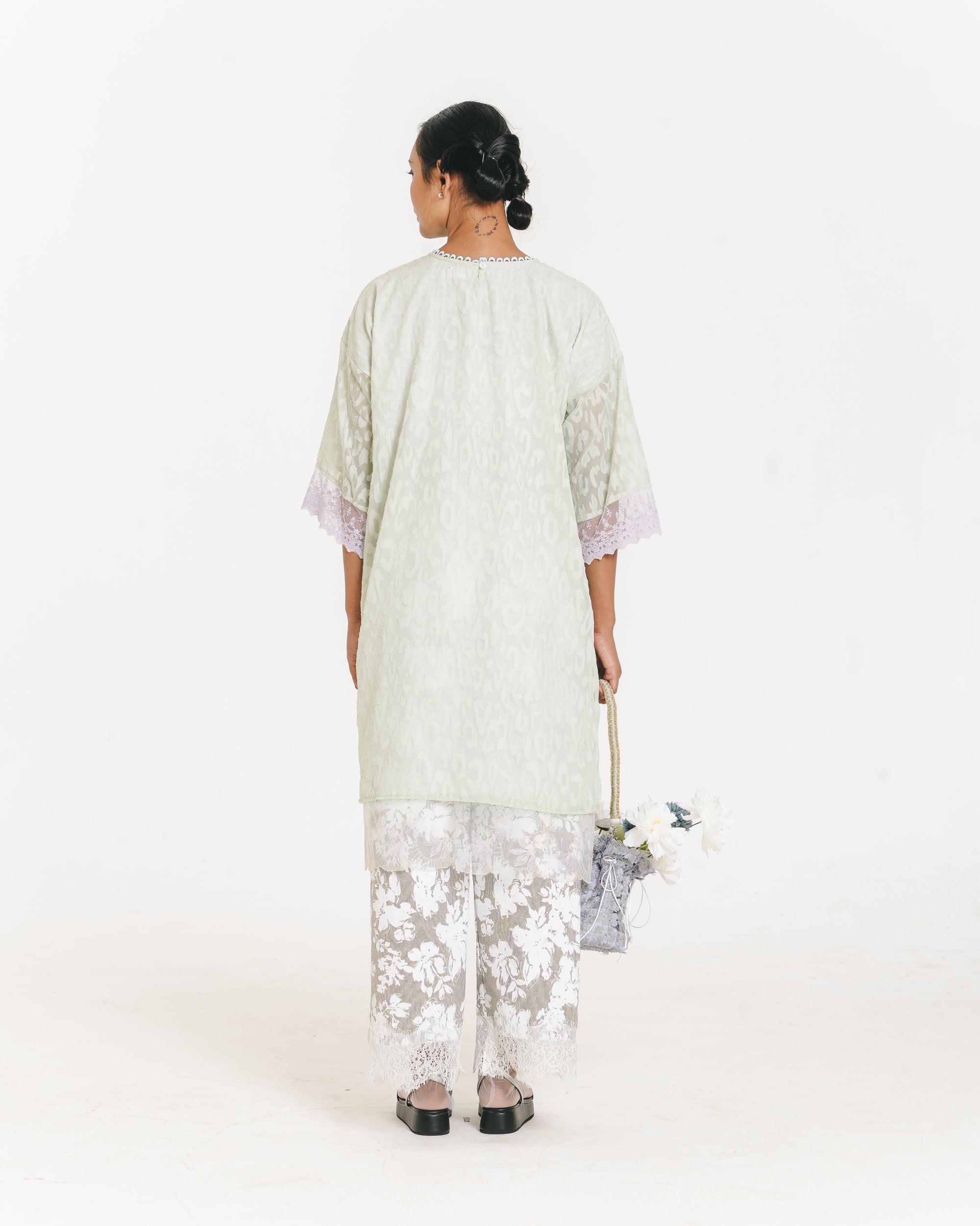 Image of Alberina Lace Kaftan, a kaftan made from cotton-poly with a subtle abstract pattern.