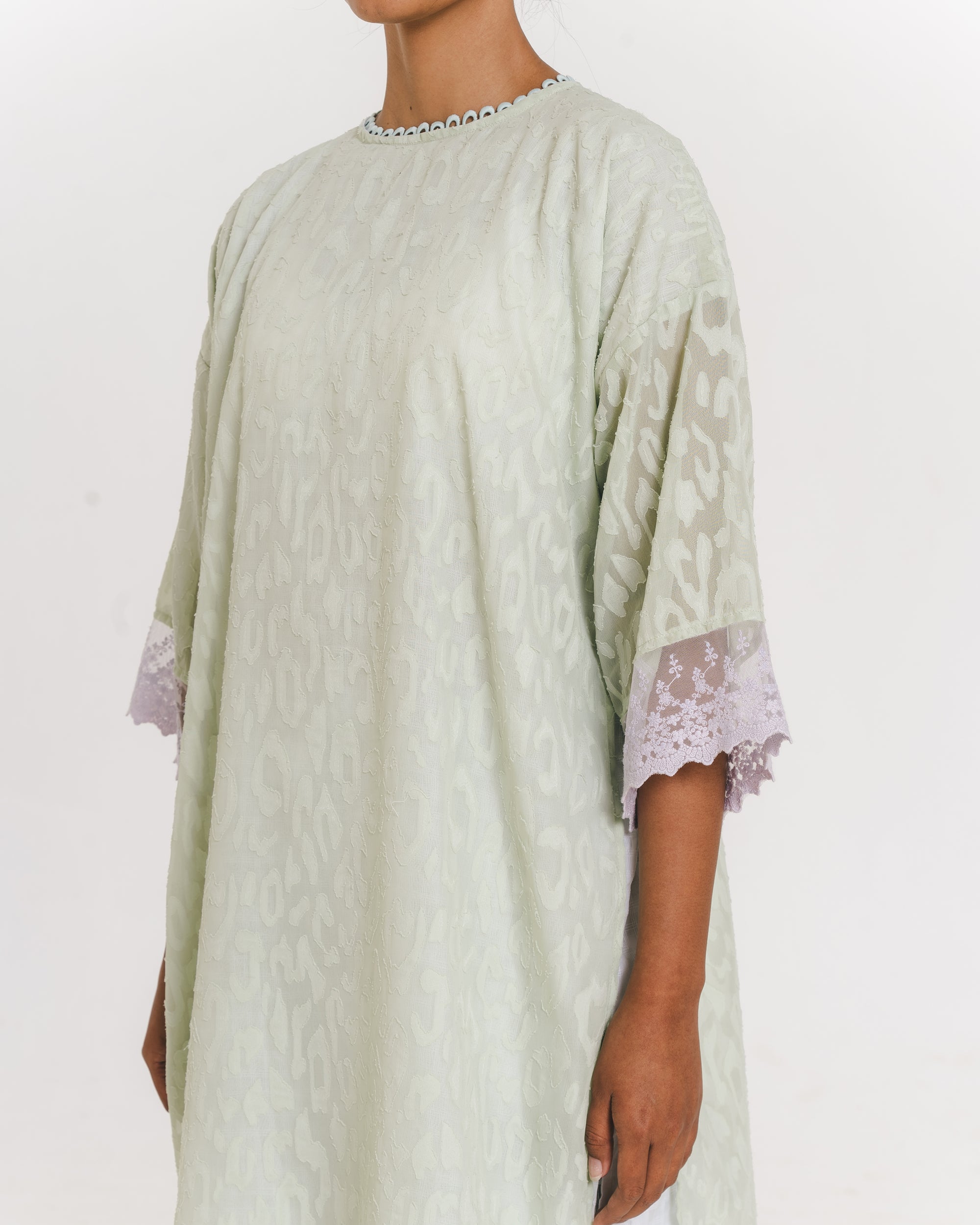 Image of Alberina Lace Kaftan, a kaftan made from cotton-poly with a subtle abstract pattern.