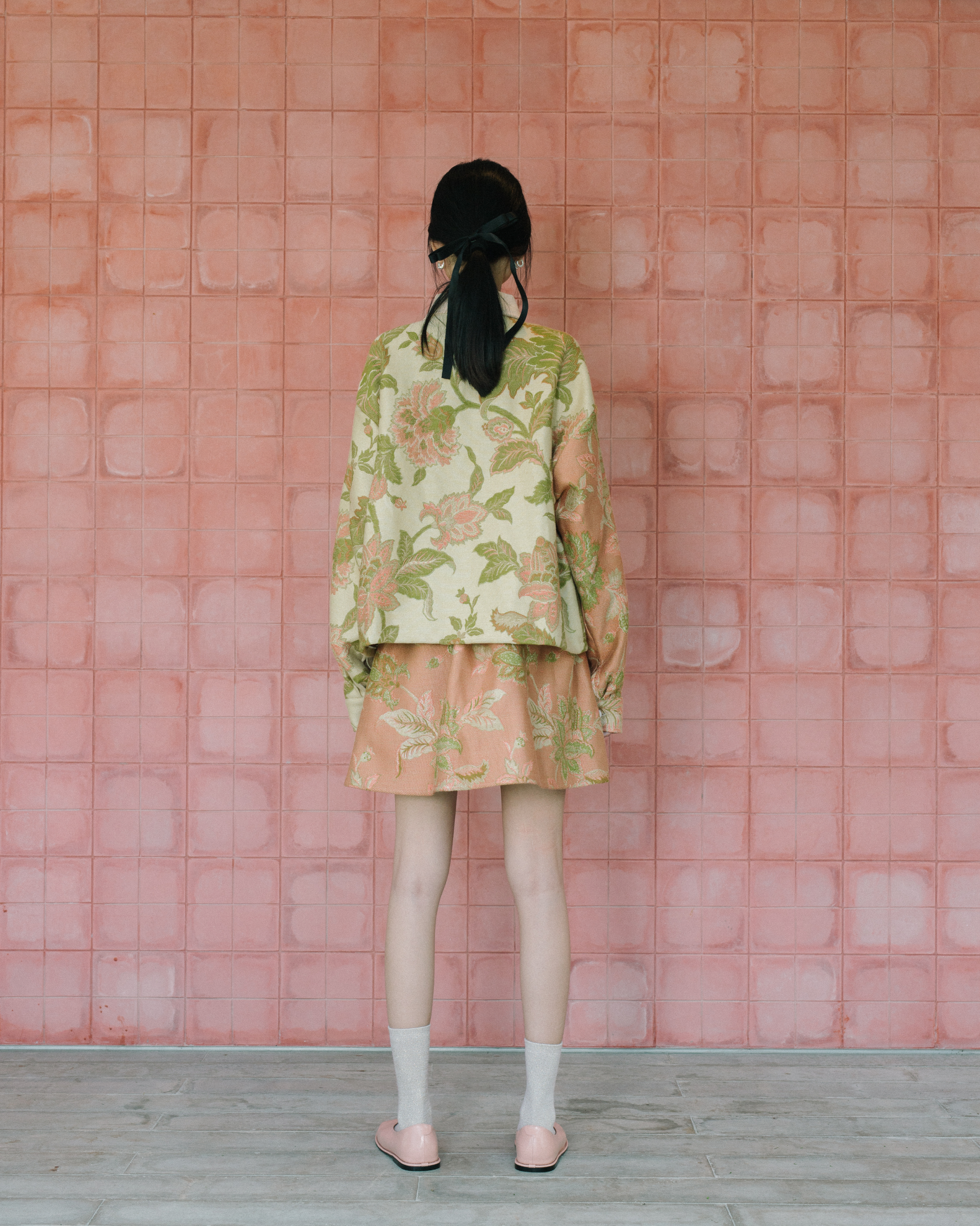 Image of Gretl Flower Jacket, a relaxed fit jacket made from jacquard fabric, adorned with unique white buttons.