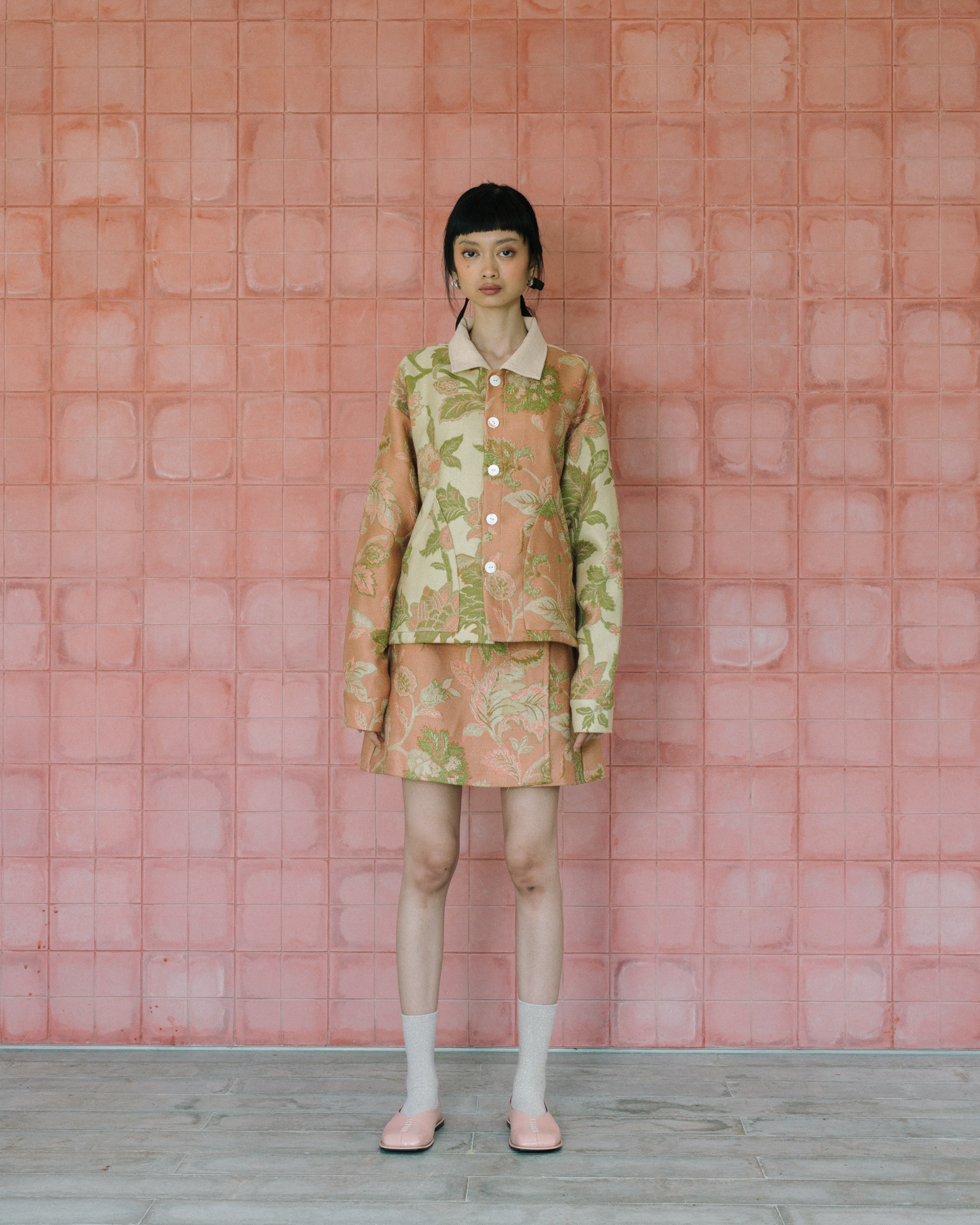 Image of Gretl Flower Jacket, a relaxed fit jacket made from jacquard fabric, adorned with unique white buttons.