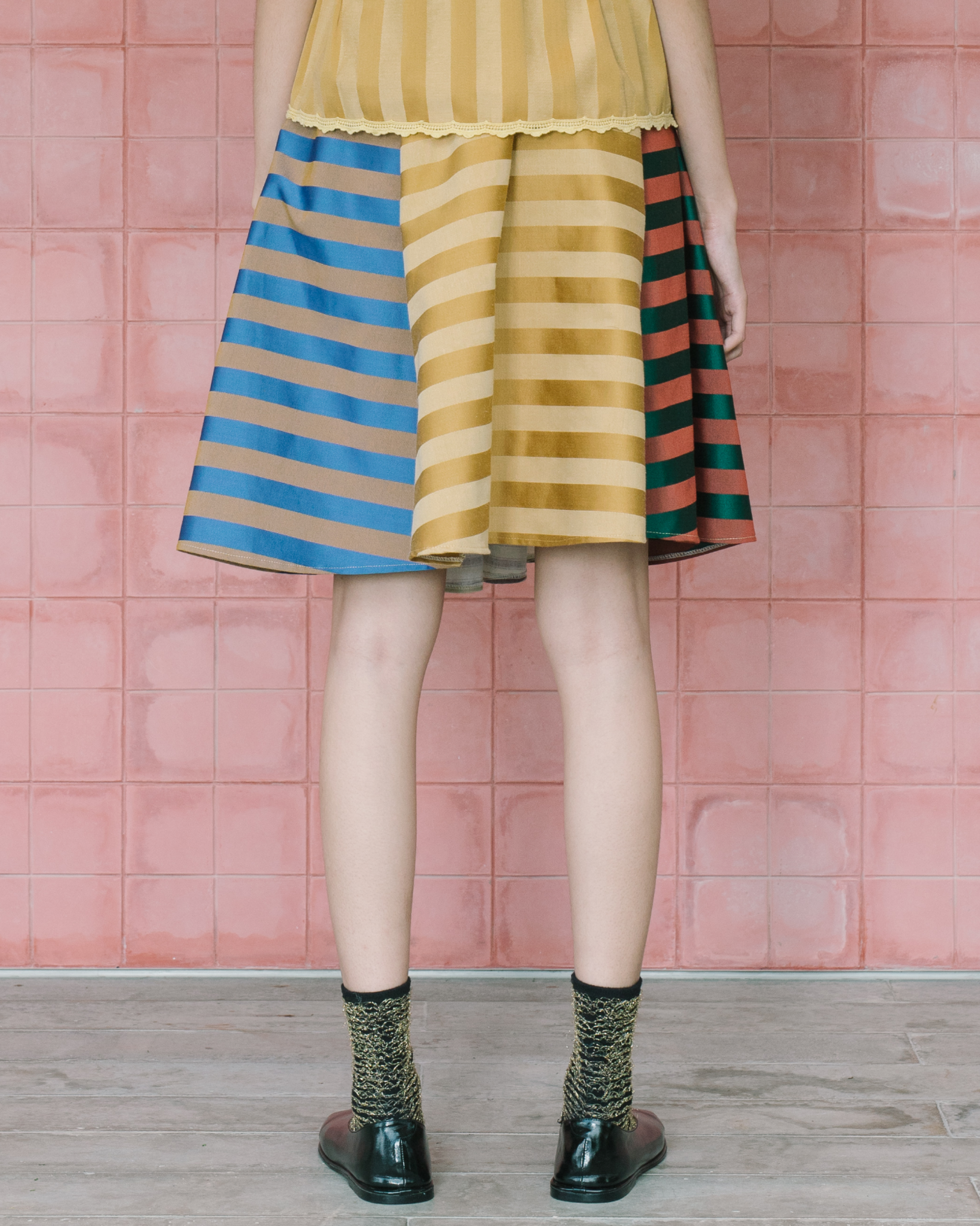 Image of Jud Skirt, a timeless piece of elegance crafted from jacquard cotton with unique texture and pattern.