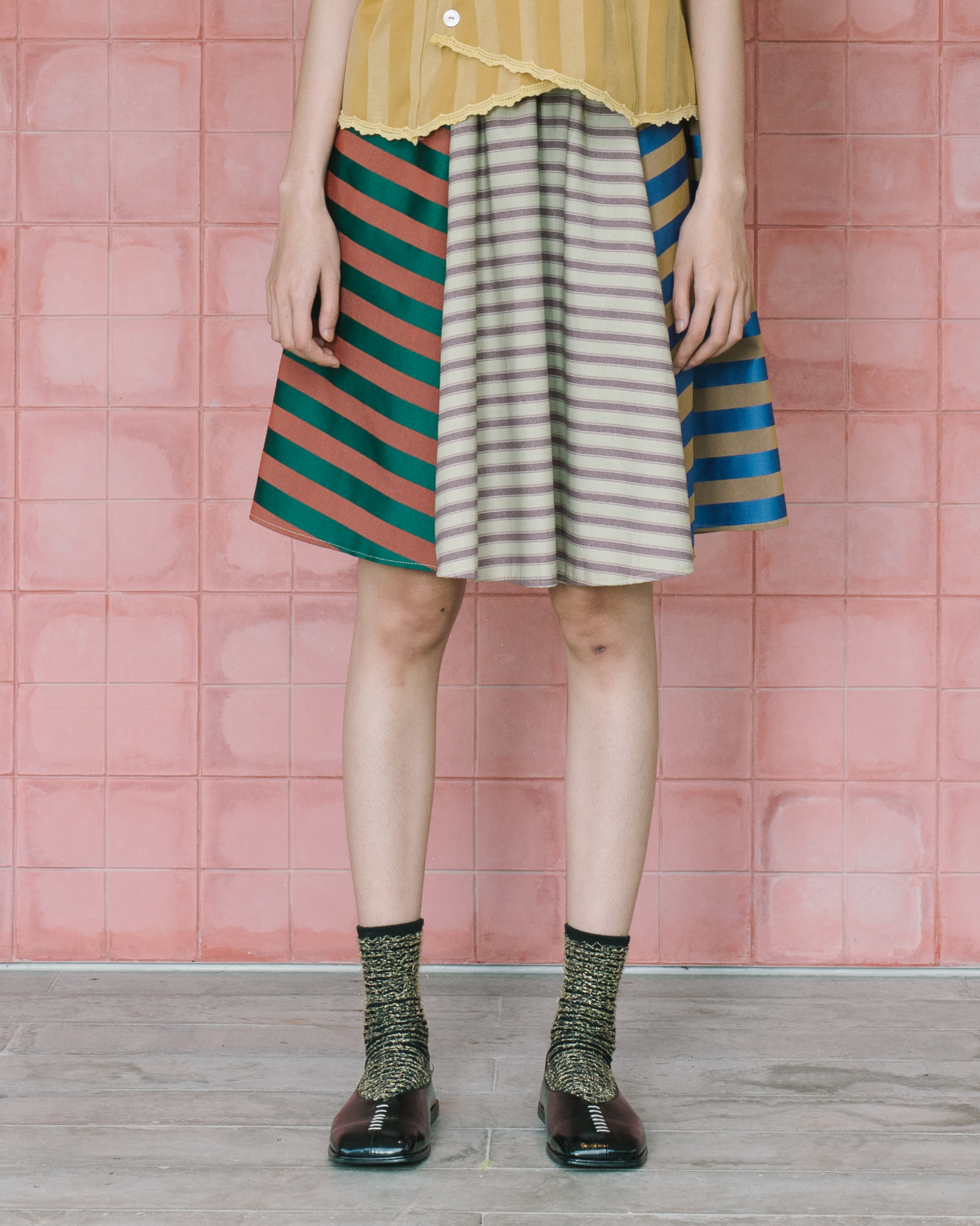 Image of Jud Skirt, a timeless piece of elegance crafted from jacquard cotton with unique texture and pattern.
