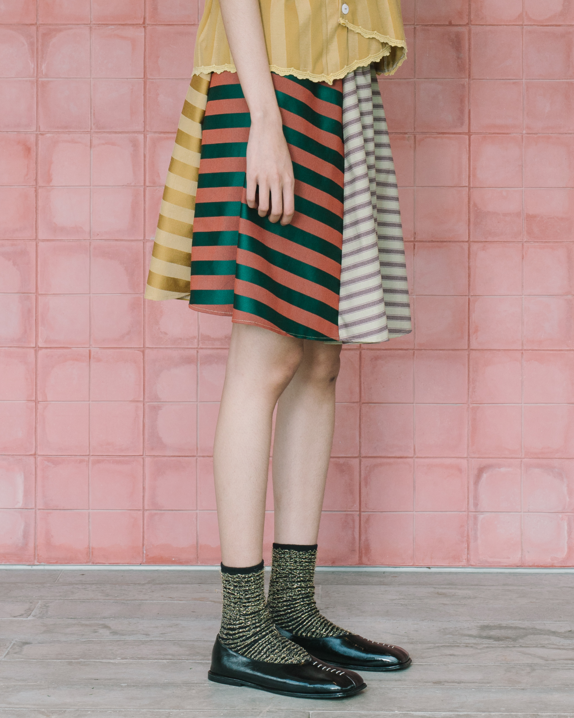 Image of Jud Skirt, a timeless piece of elegance crafted from jacquard cotton with unique texture and pattern.