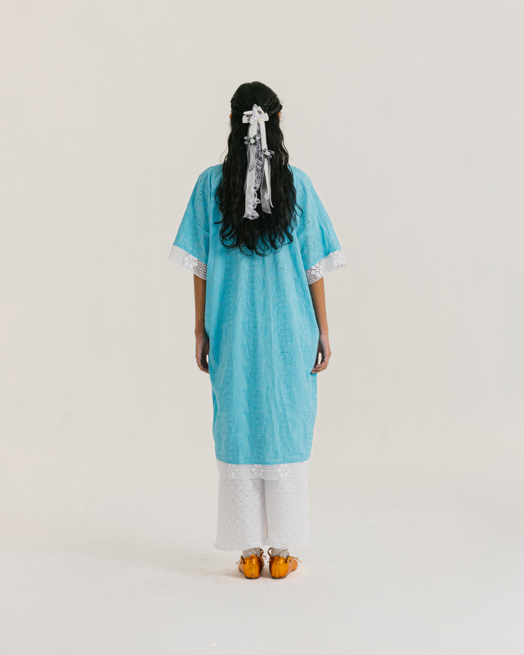 Image of Millie Kaftan Multi, a loose-fitting kaftan made from vibrant embroidered cotton.