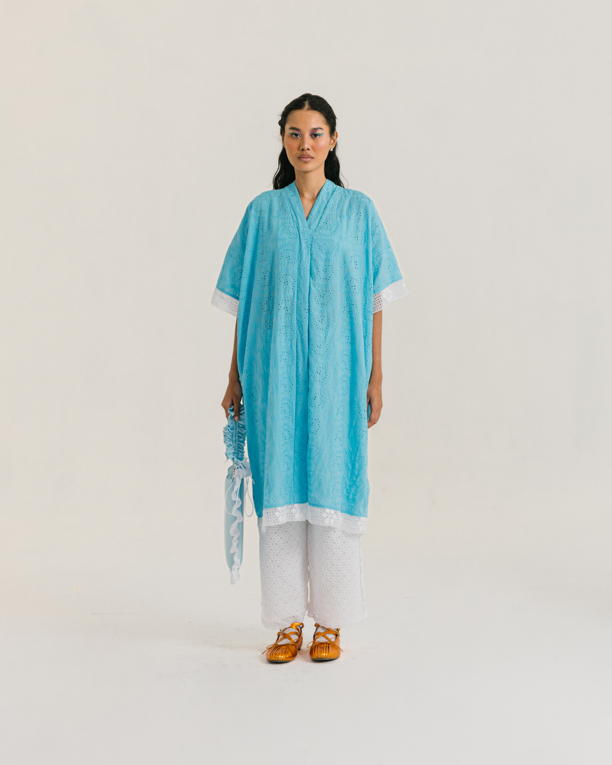 Image of Millie Kaftan Multi, a loose-fitting kaftan made from vibrant embroidered cotton.