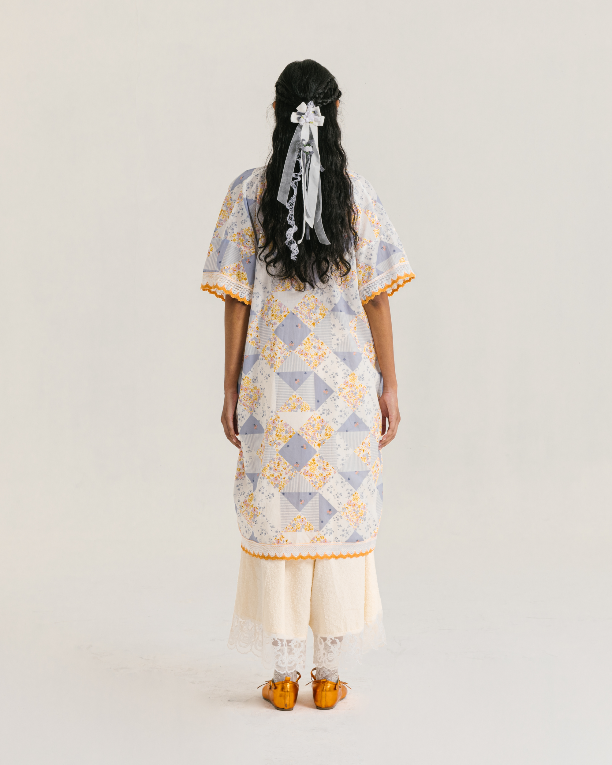 Image of Millie Kaftan Multi, a loose-fitting kaftan made from breezy cotton with a patchwork pattern.