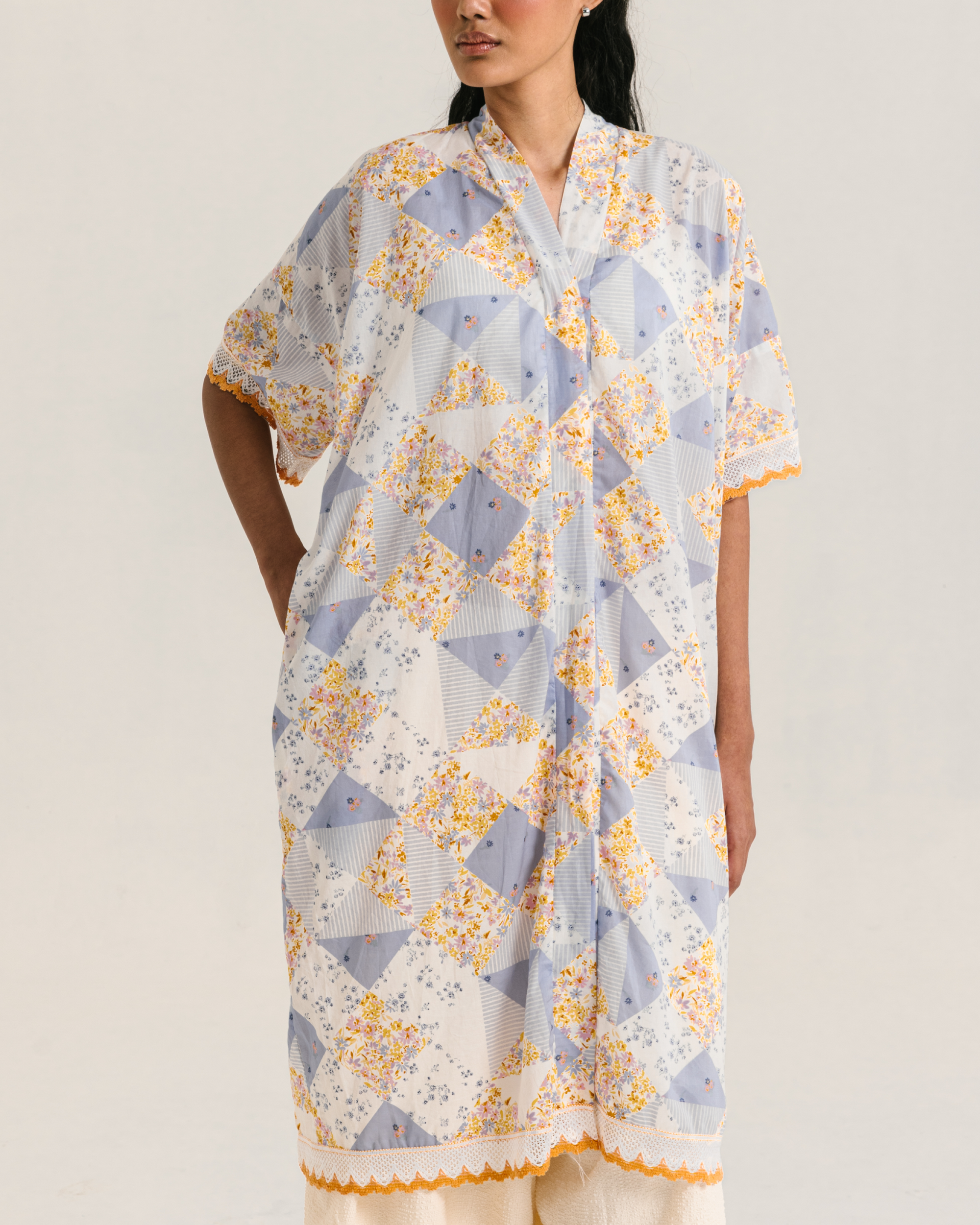Image of Millie Kaftan Multi, a loose-fitting kaftan made from breezy cotton with a patchwork pattern.