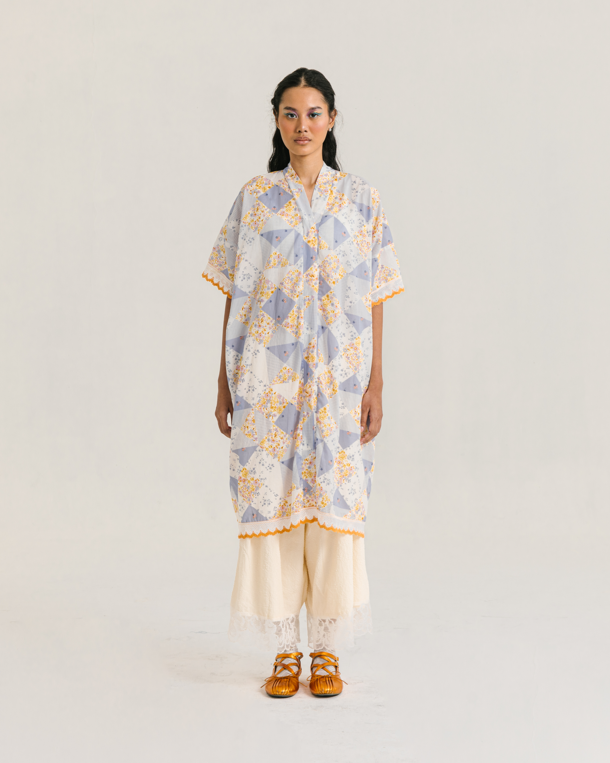 Image of Millie Kaftan Multi, a loose-fitting kaftan made from breezy cotton with a patchwork pattern.