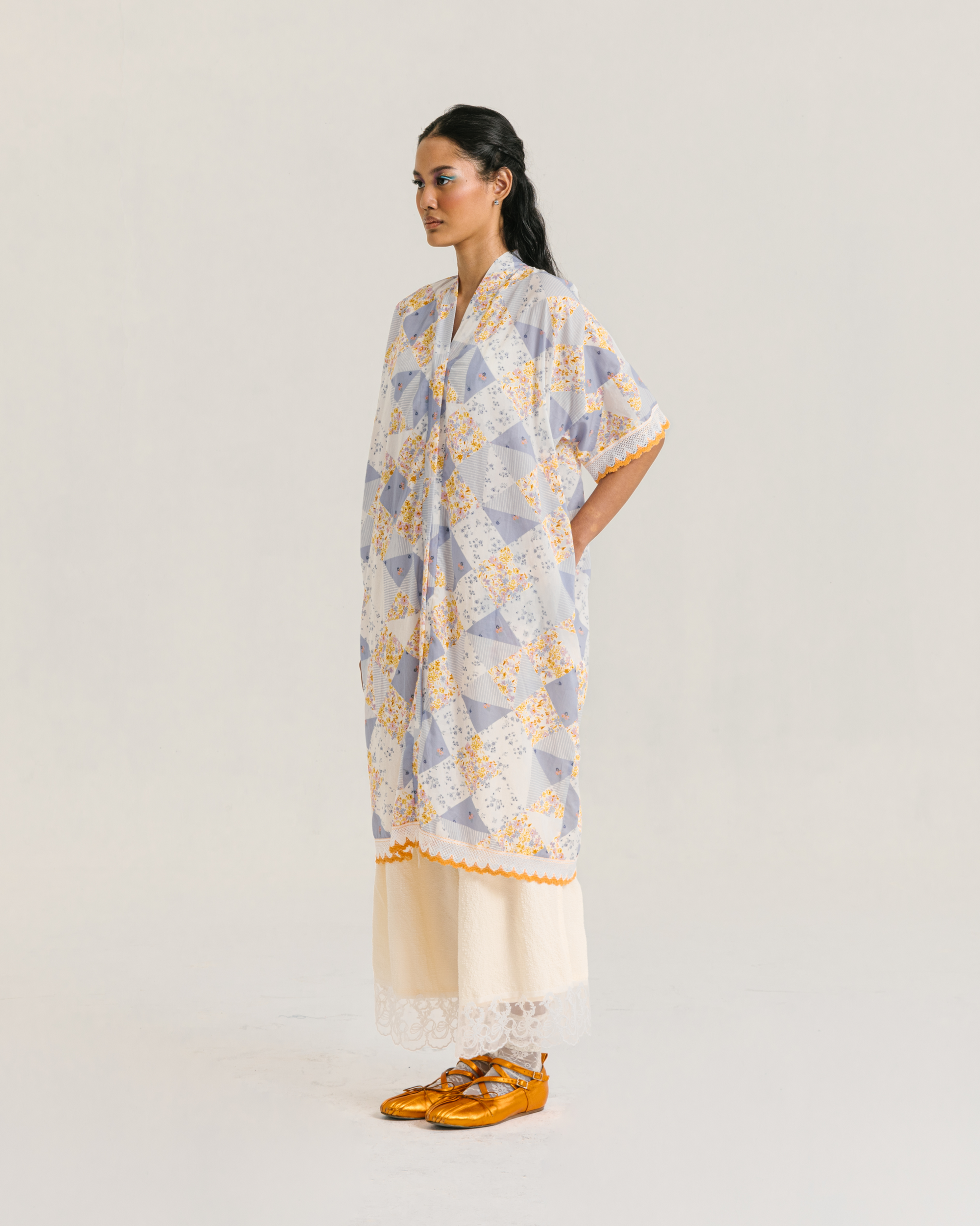 Image of Millie Kaftan Multi, a loose-fitting kaftan made from breezy cotton with a patchwork pattern.