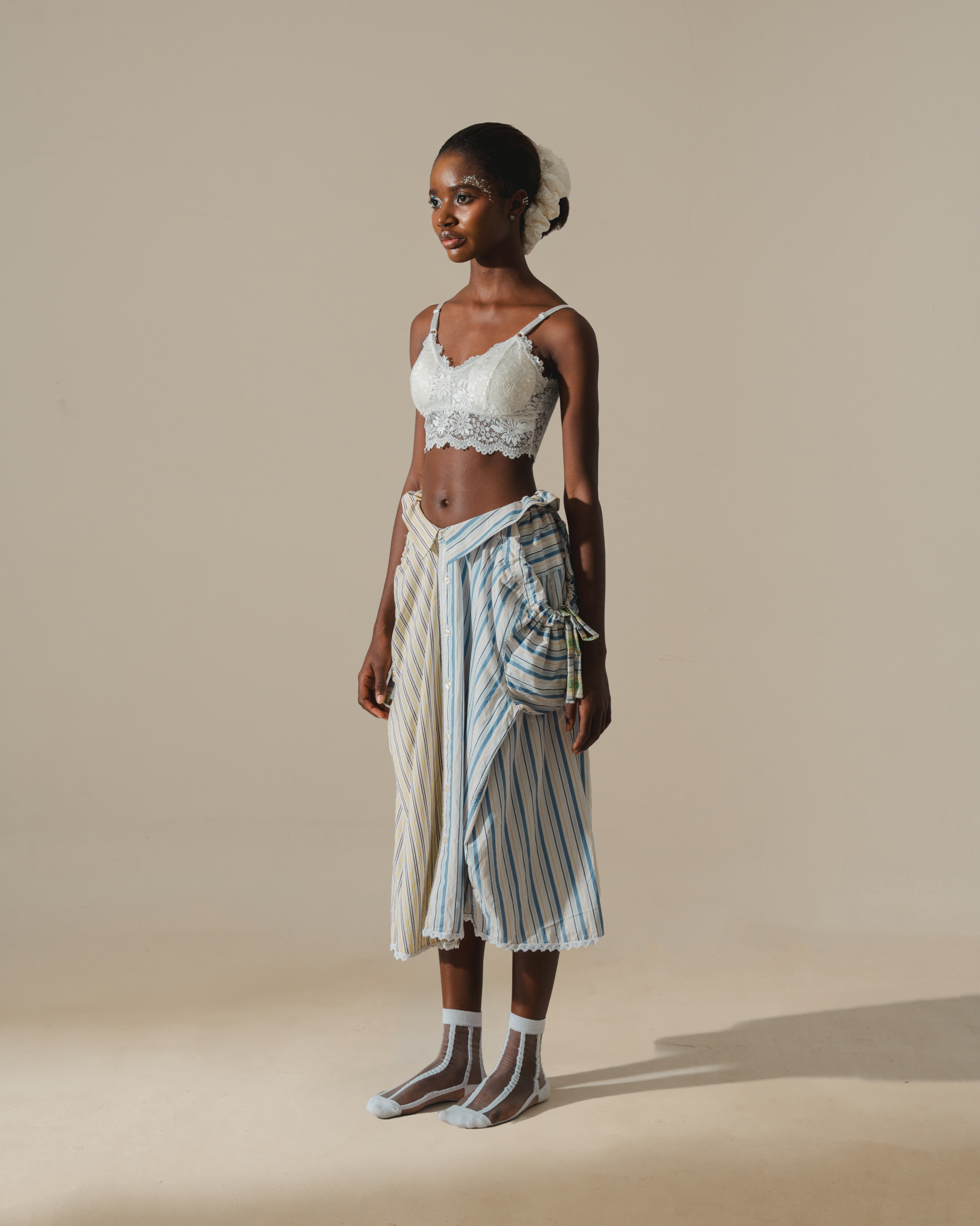 Image of RE-WORK SKIRT, a midi skirt made from two shirts combined together.