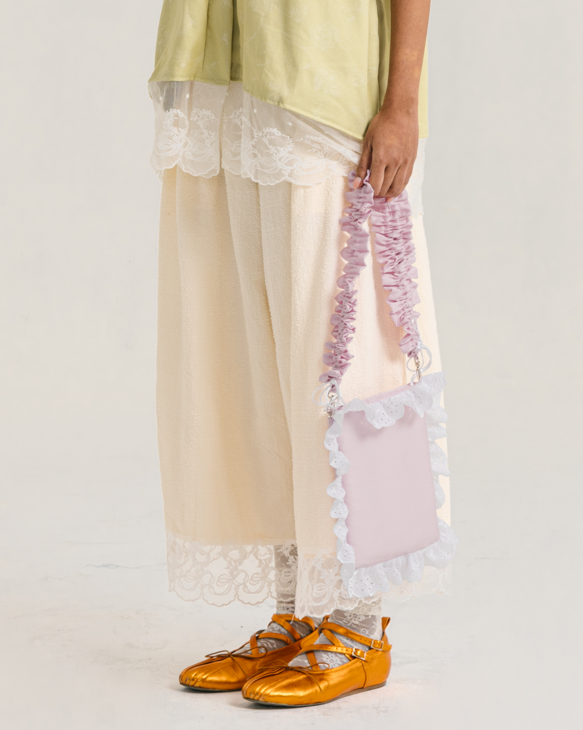 Image of Wisteria Pants Creme, a relaxed wide-leg pants made from cotton with a balloon-like sillhouette.