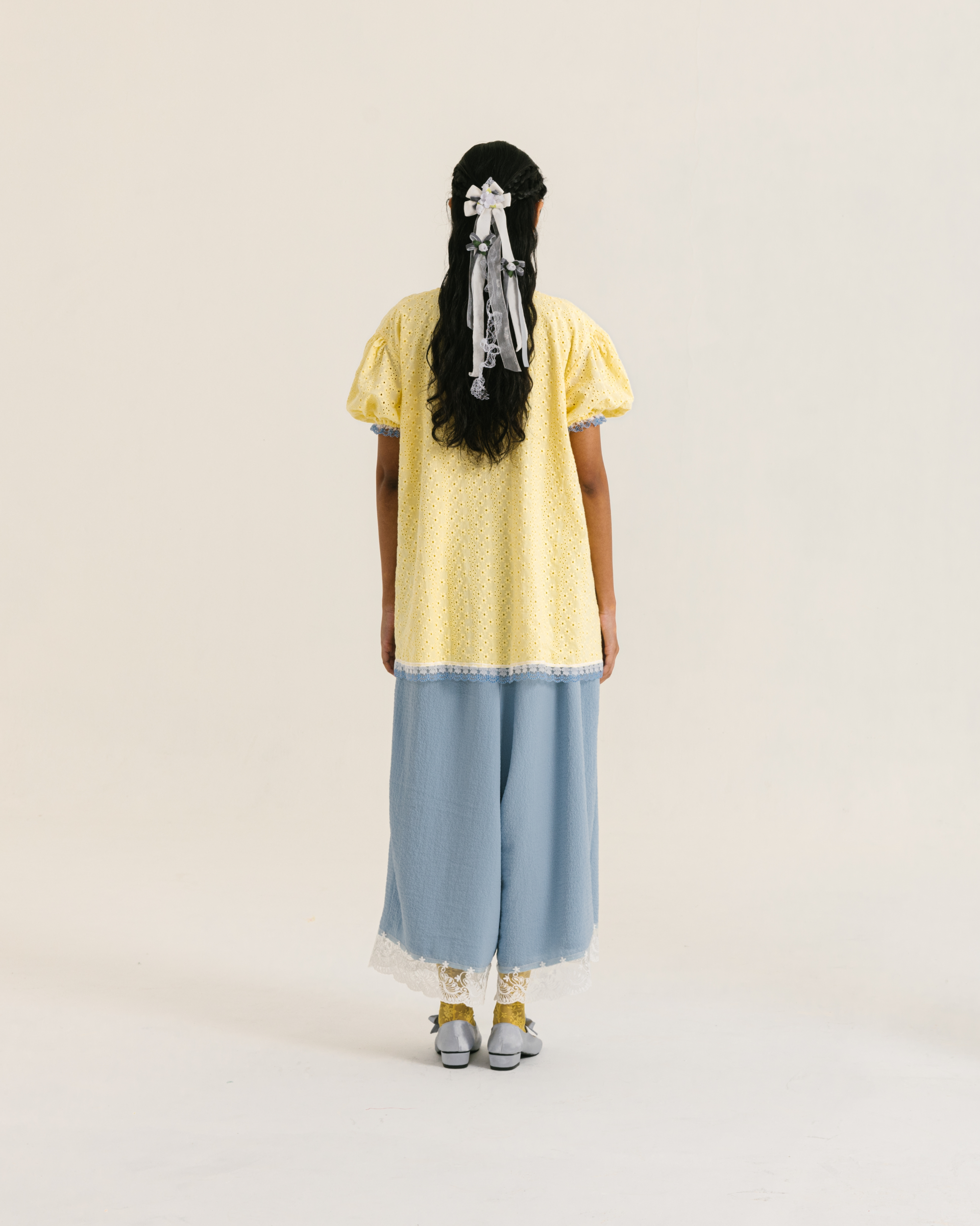 Image of Alaia Blouse Yellow, a loose blouse with a subtle balloon sleeves and charming v-neckline.