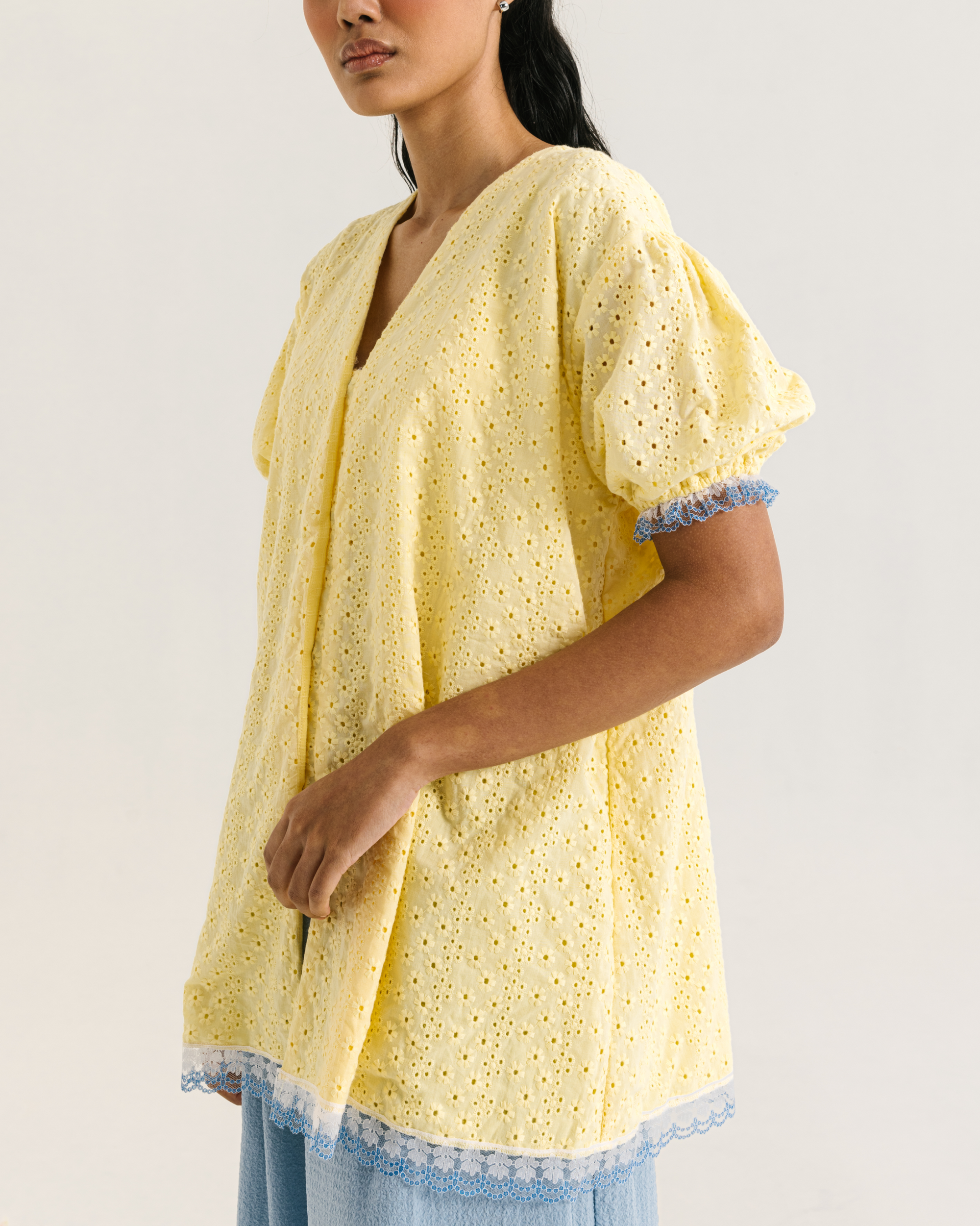 Image of Alaia Blouse Yellow, a loose blouse with a subtle balloon sleeves and charming v-neckline.