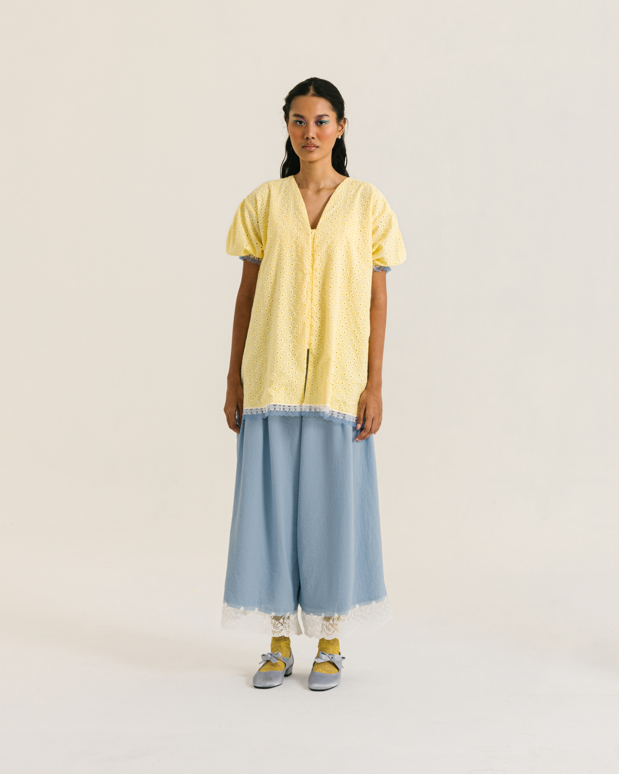 Image of Alaia Blouse Yellow, a loose blouse with a subtle balloon sleeves and charming v-neckline.