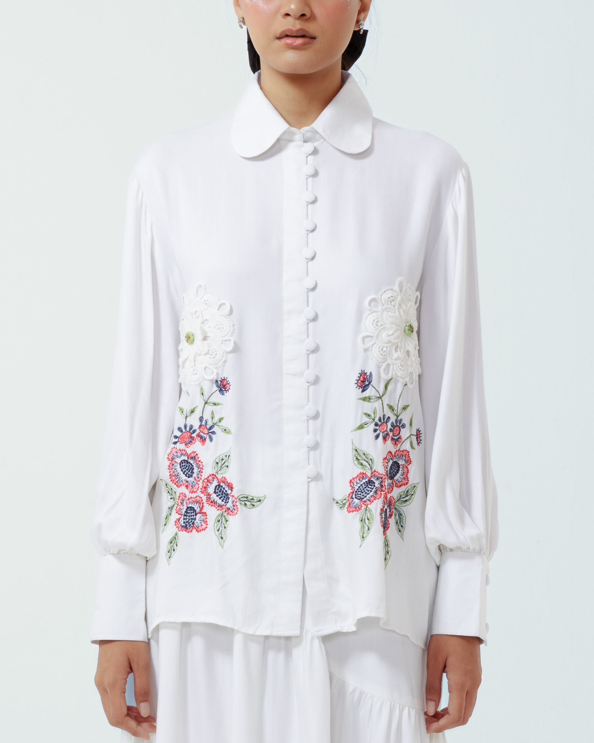 Image of Amor Longsleeve Shirt, a longsleeve shirt made from jersey cotton, with a subtle puff on the sleeves and chic floral embroidery on the front.