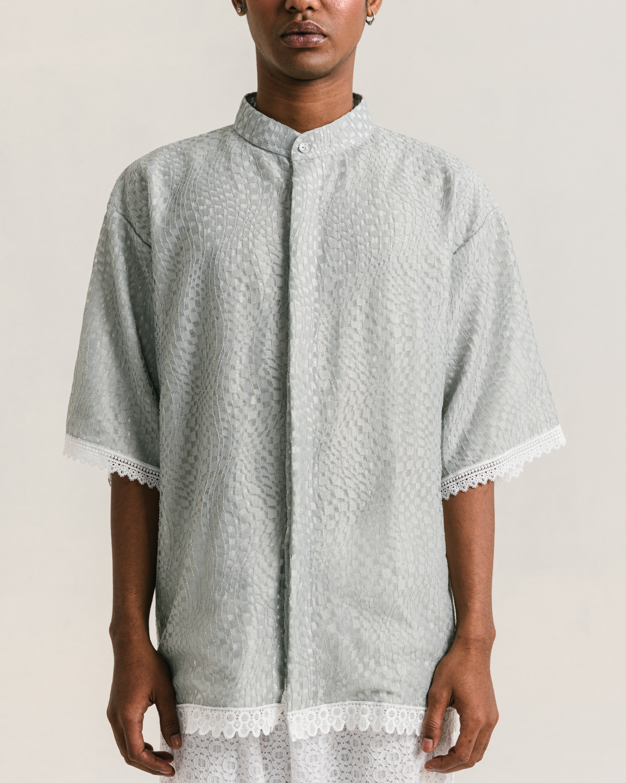 Image of Archie Koko Shirt Green, an oversized koko shirt made from brocade with a cotton lining underneath.