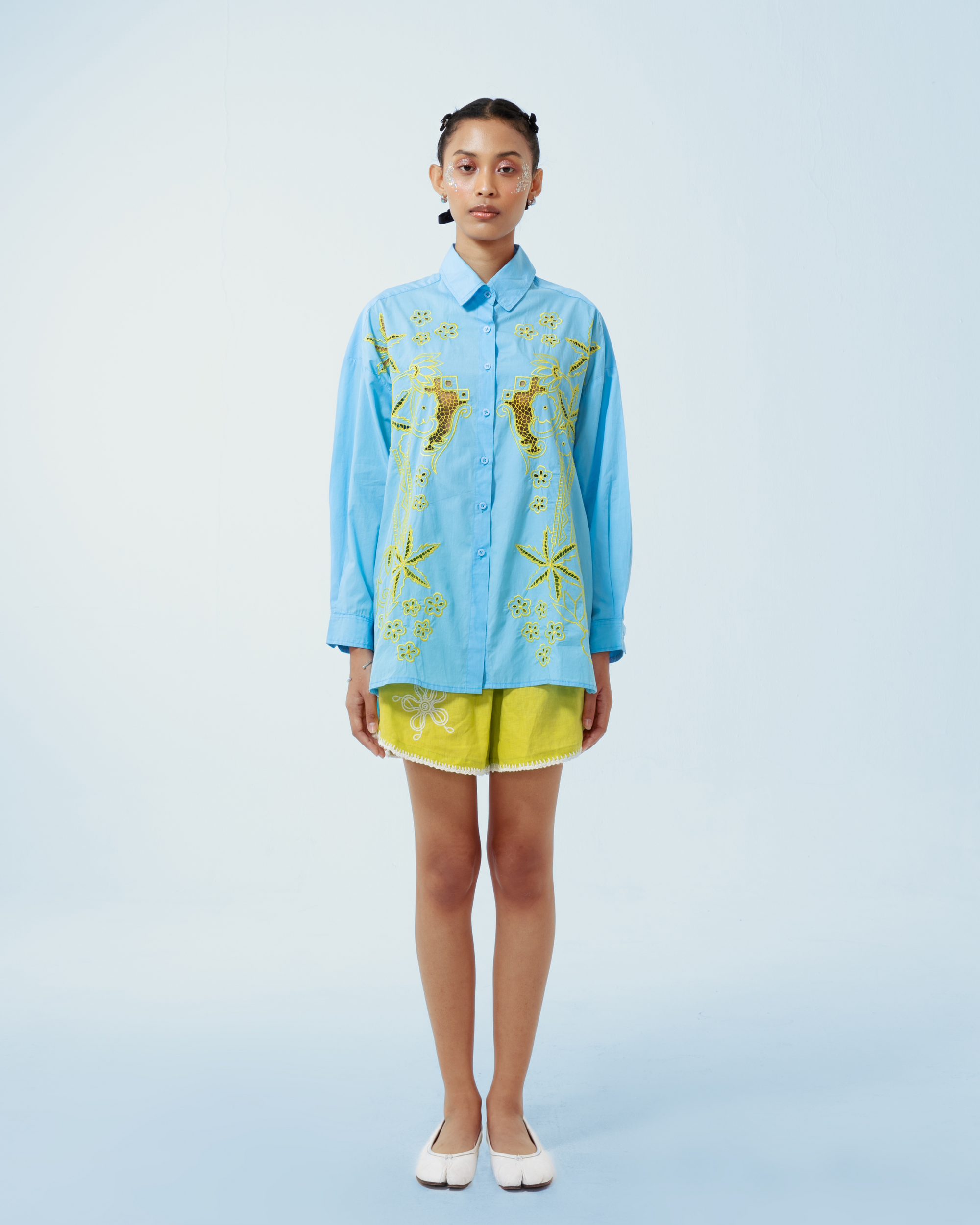 Image of Azul Longsleeve Shirt, a longsleeve shirt made from cotton poplin, adorned with hand-embroidery motifs inspired by kerawang embroidery.