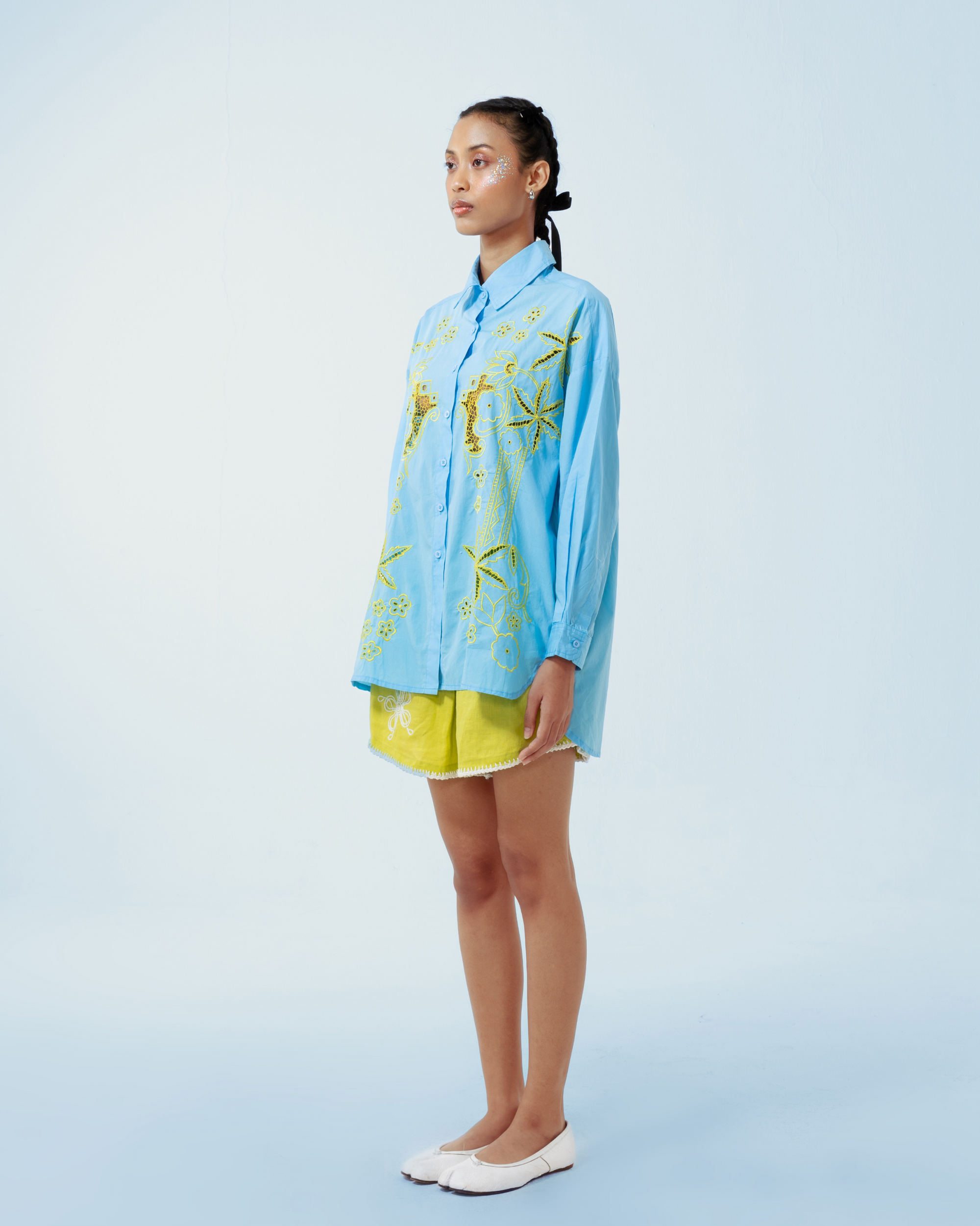 Image of Azul Longsleeve Shirt, a longsleeve shirt made from cotton poplin, adorned with hand-embroidery motifs inspired by kerawang embroidery.