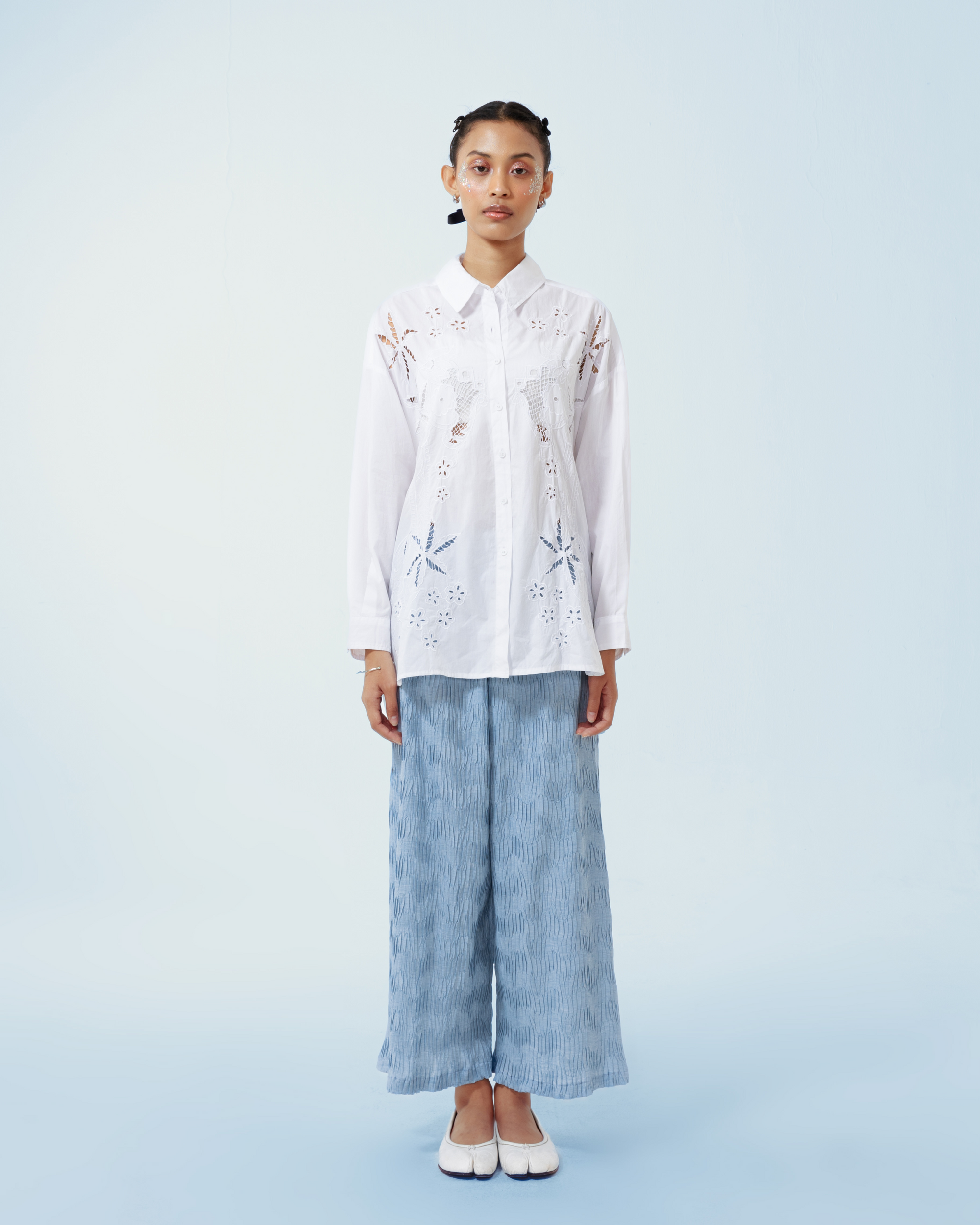 Image of Azul Longsleeve Shirt, a longsleeve shirt made from cotton poplin, adorned with hand-embroidery motifs inspired by kerawang embroidery.