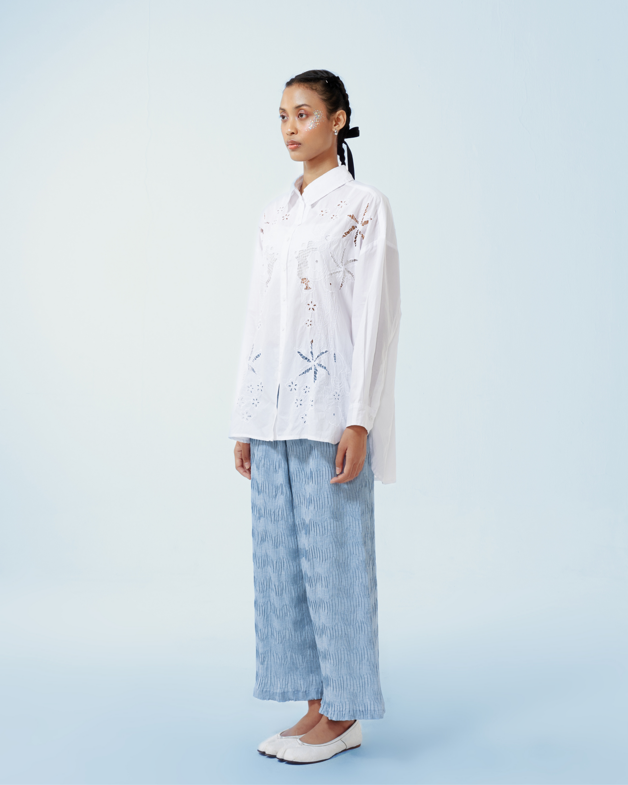 Image of Azul Longsleeve Shirt, a longsleeve shirt made from cotton poplin, adorned with hand-embroidery motifs inspired by kerawang embroidery.