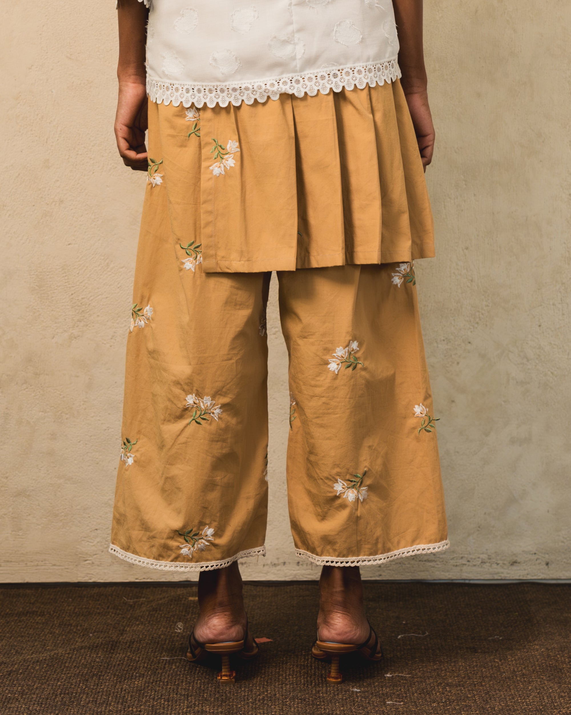 Image of Carti Embroidery Pants, wide-leg relaxed pants made from cotton, adorned with flower embroideries.