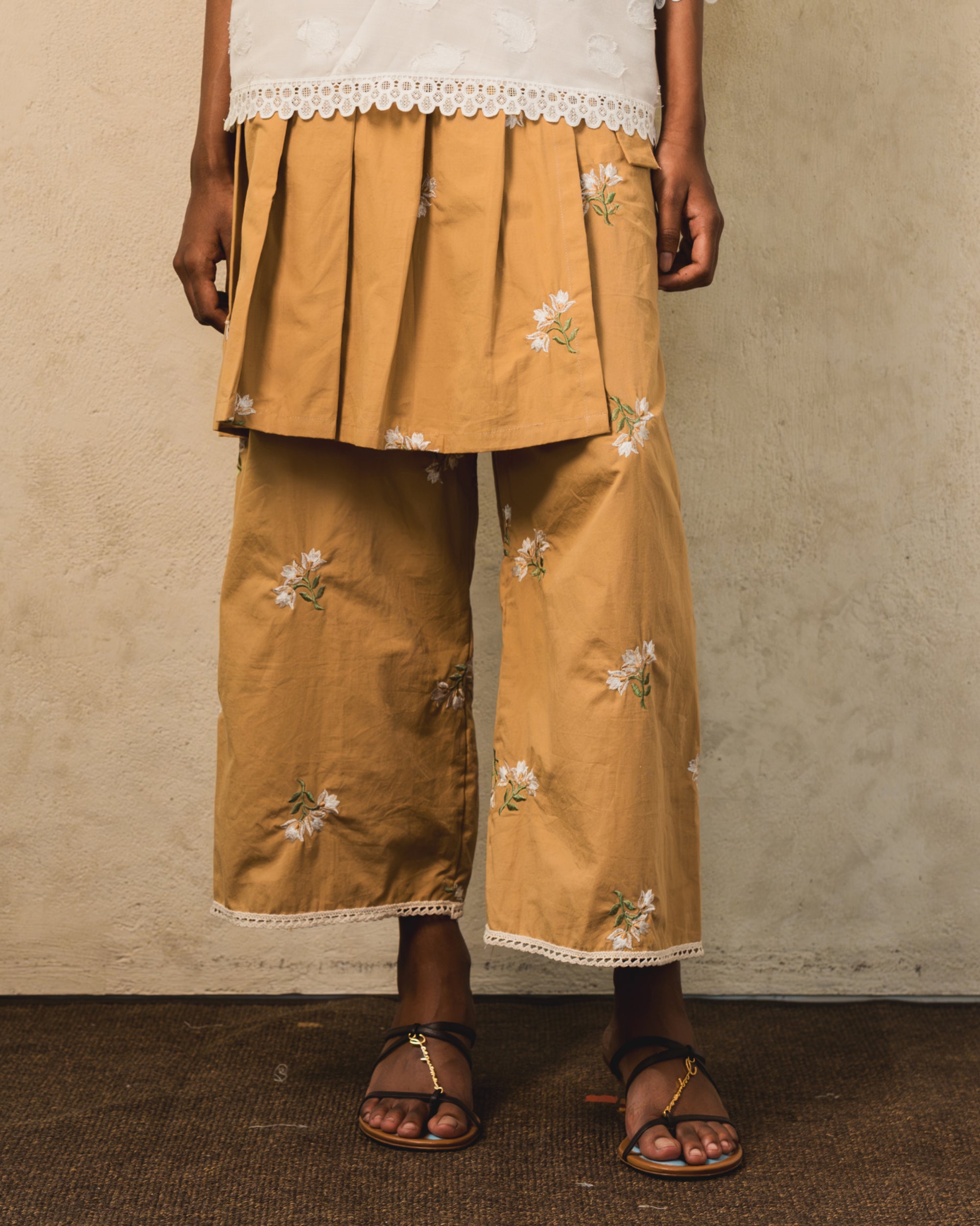 Image of Carti Embroidery Pants, wide-leg relaxed pants made from cotton, adorned with flower embroideries.