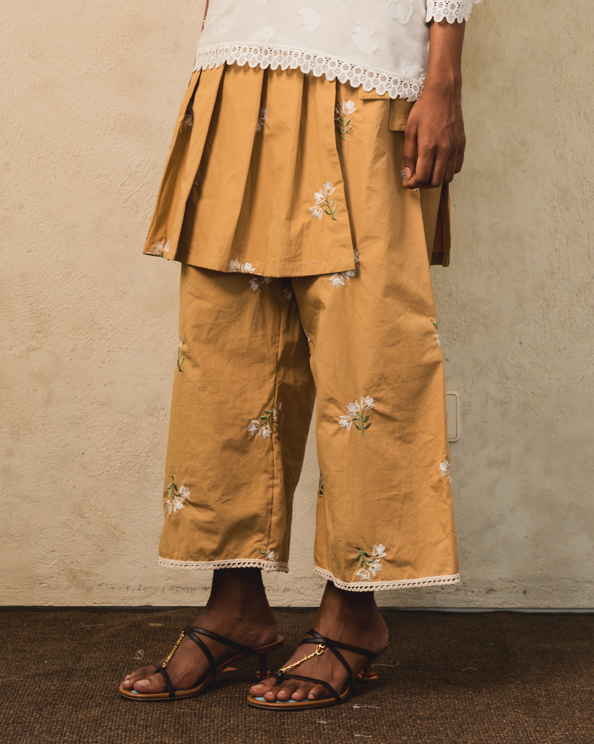 Image of Carti Embroidery Pants, wide-leg relaxed pants made from cotton, adorned with flower embroideries.