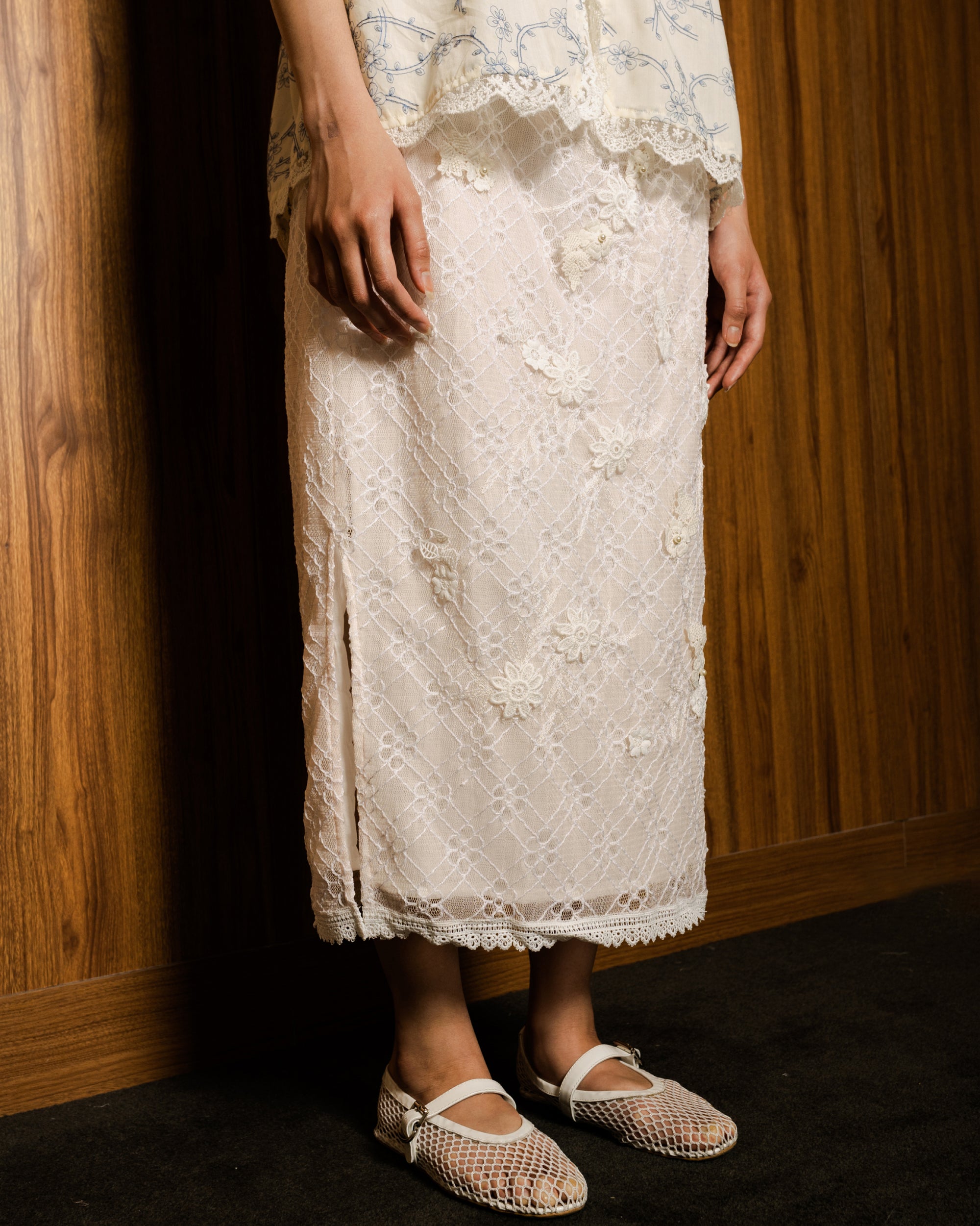 Image of Celuna Skirt Pink, a midi skirt made from embroidered lace.