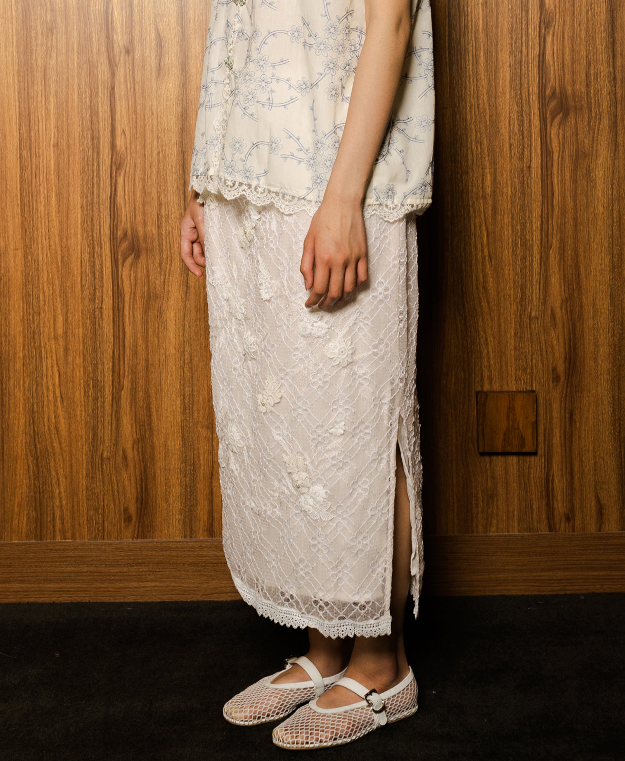 Image of Celuna Skirt Pink, a midi skirt made from embroidered lace.