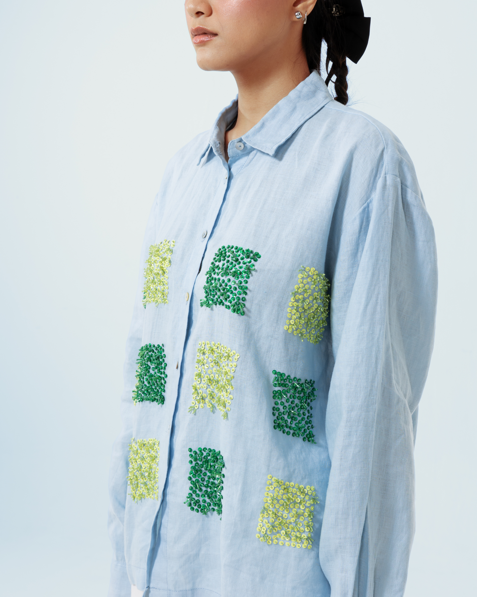 Image of Claude Longsleeve Shirt, a linen longsleeve shirt adorned with hand-sewn beads in contrasting colors.