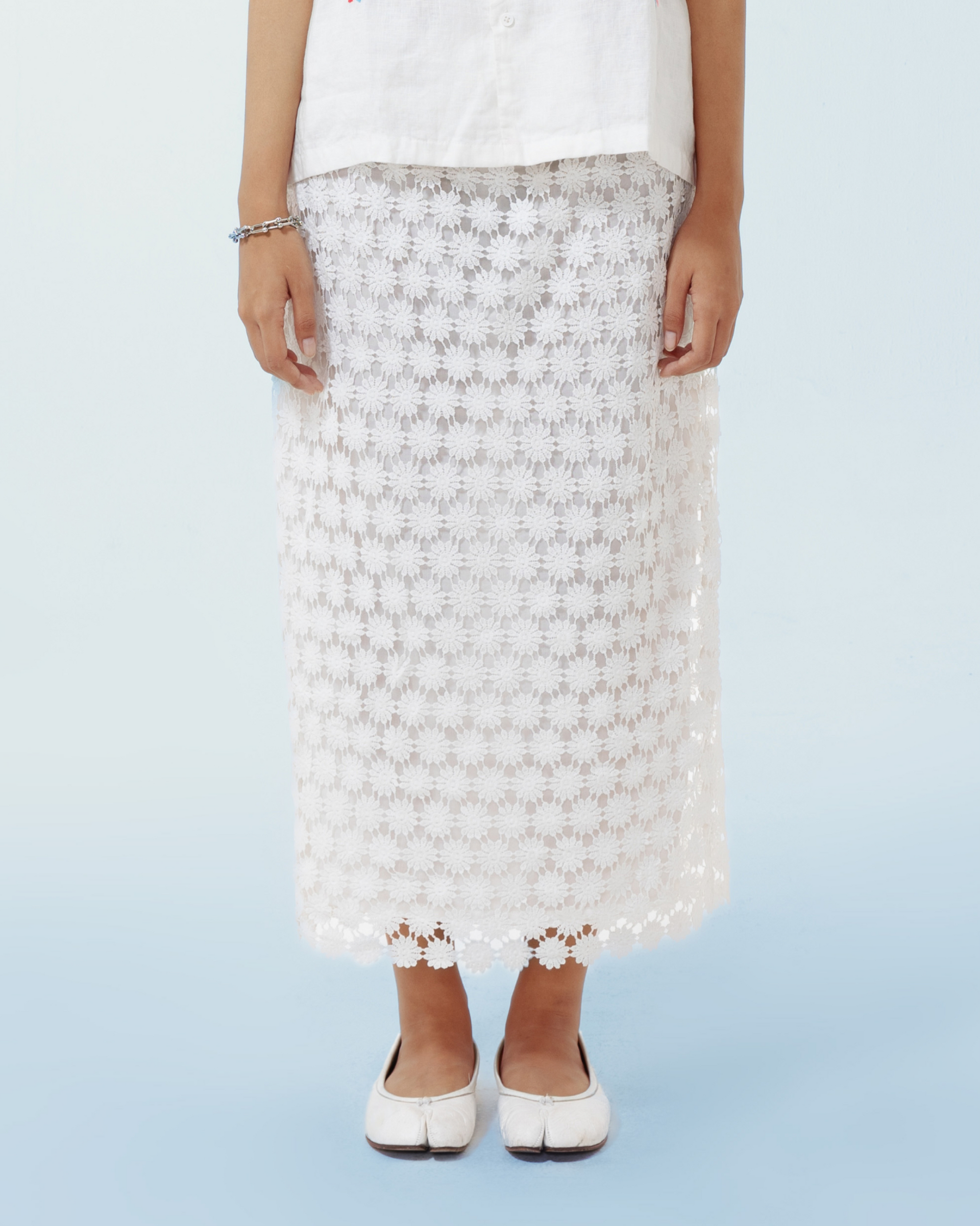 Image of Elisa Midi Skirt, a classic midi skirt made from brocade with a cotton lining underneath.