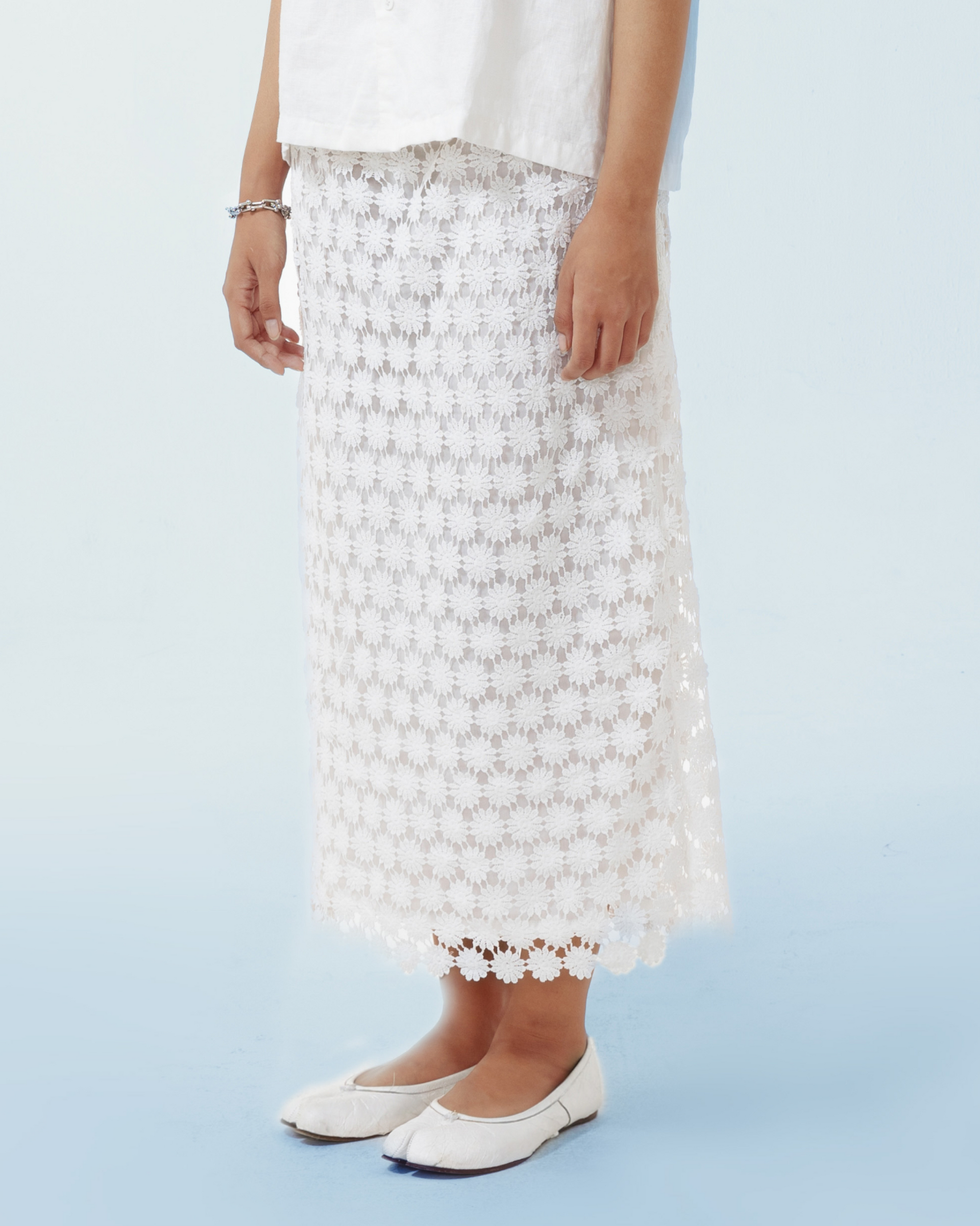 Image of Elisa Midi Skirt, a classic midi skirt made from brocade with a cotton lining underneath.