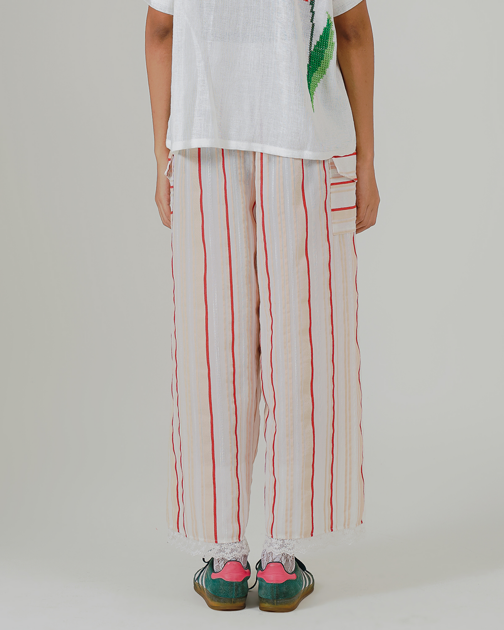 Image of Gaia Stripes Pants, a stripes linen wide-leg pants featuring pockets and elastic waistband.