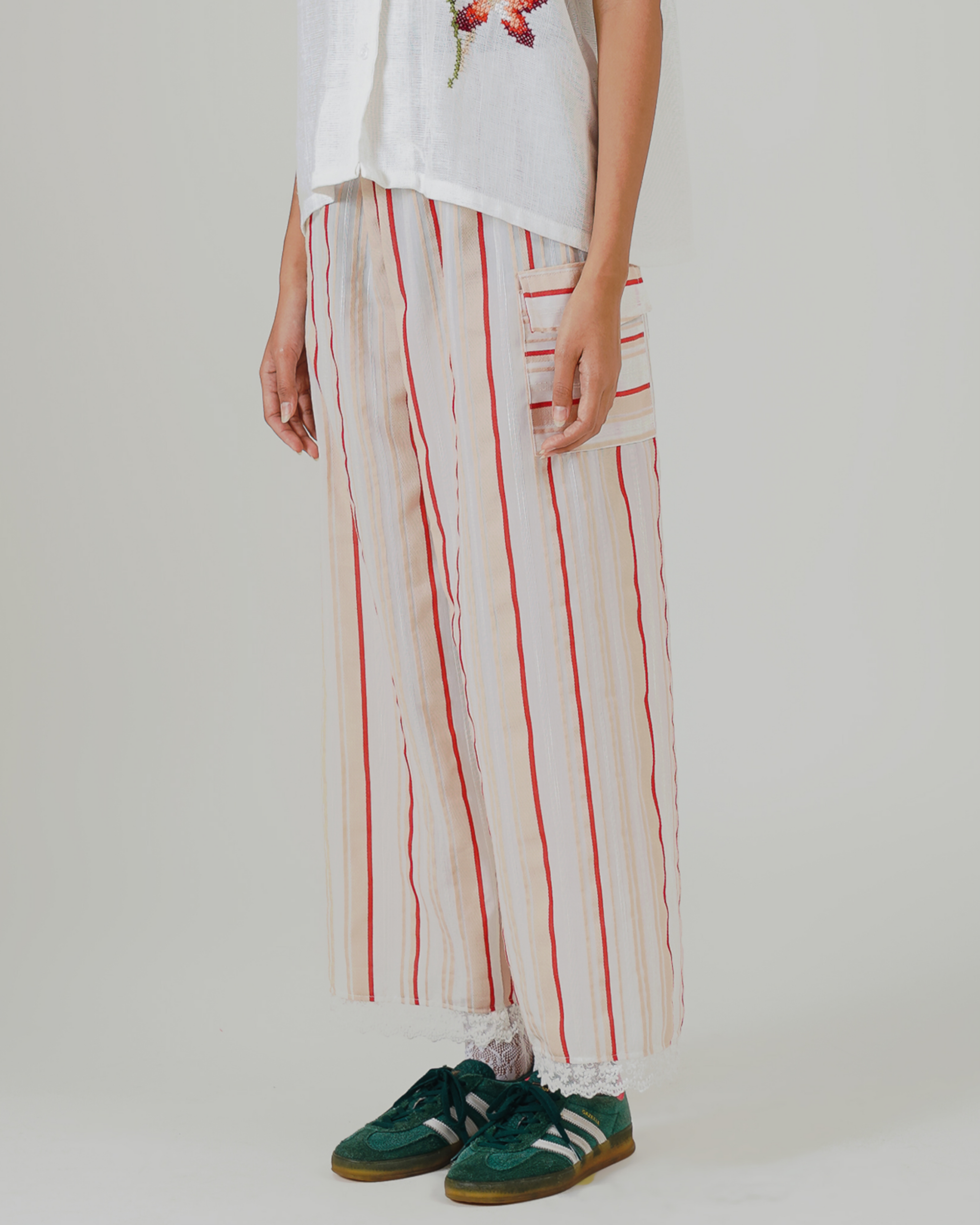 Image of Gaia Stripes Pants, a stripes linen wide-leg pants featuring pockets and elastic waistband.