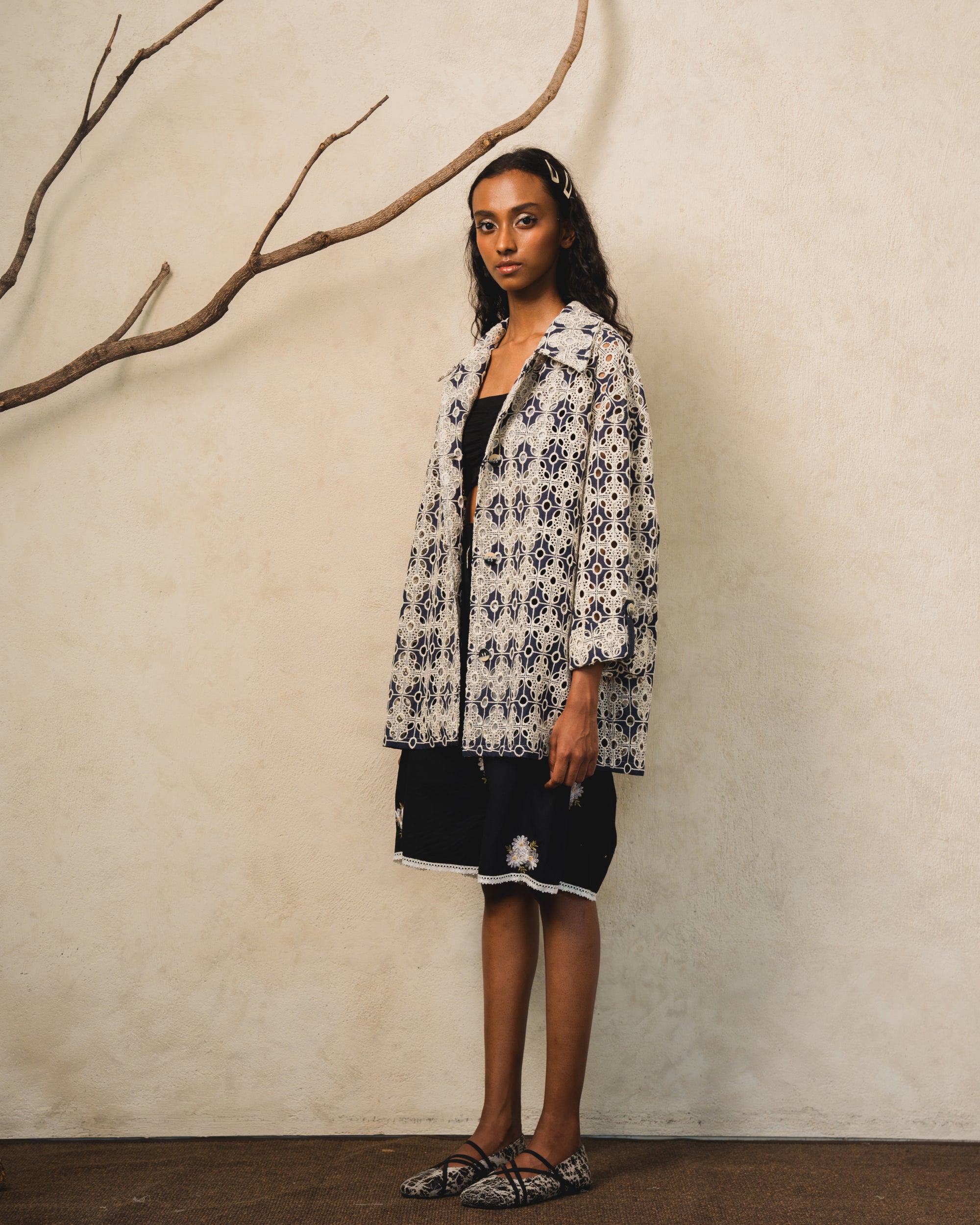 Image of Getto Embroidery Jacket, an oversized jacket made from embroidered cotton lace. 