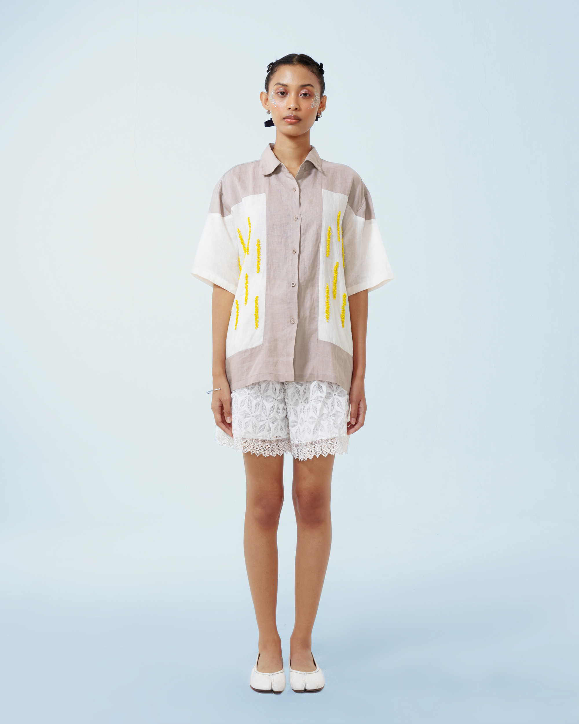 Image of Gloria Shirt, a linen shirt adorned with hand-sewn beads on the front.