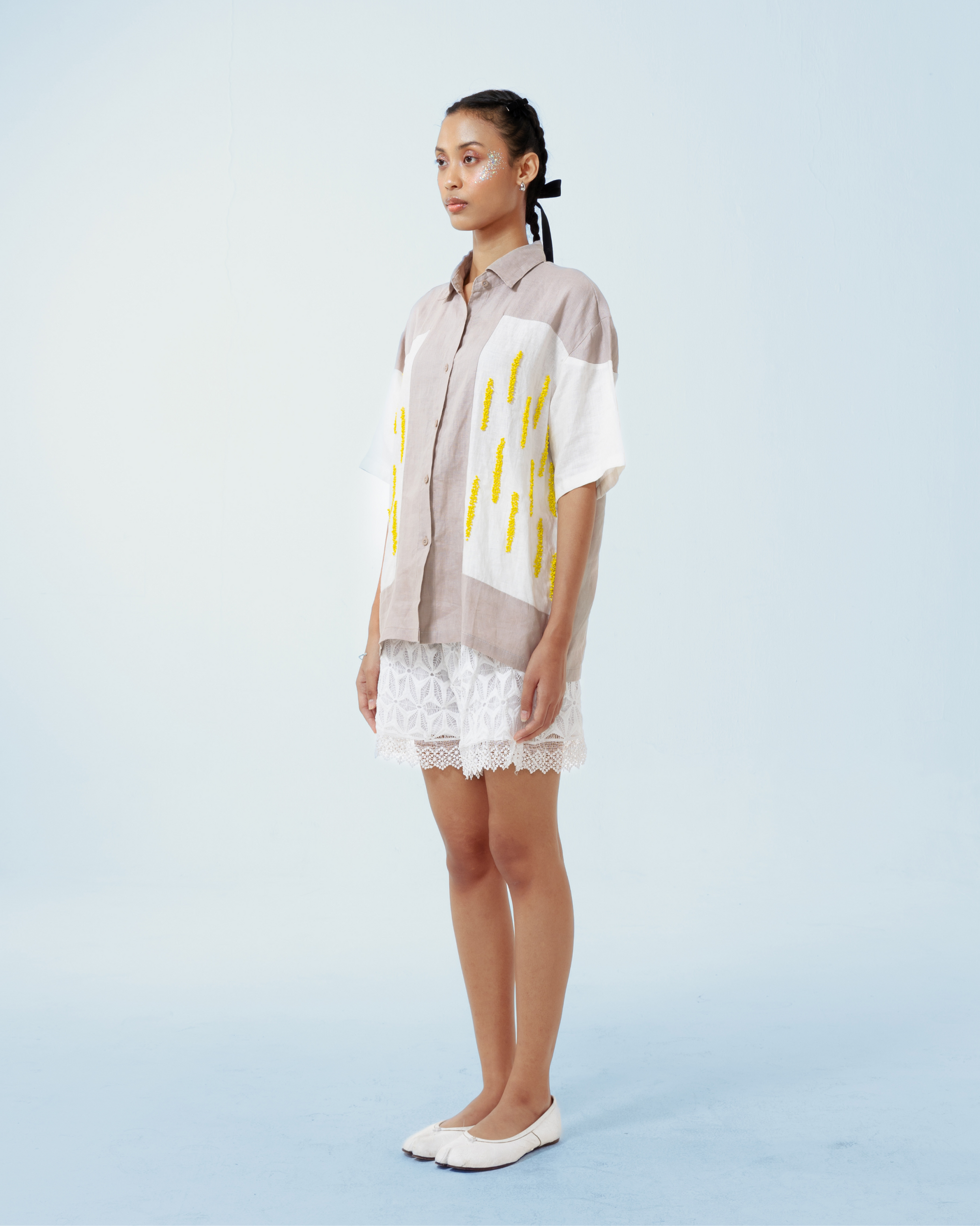 Image of Gloria Shirt, a linen shirt adorned with hand-sewn beads on the front.