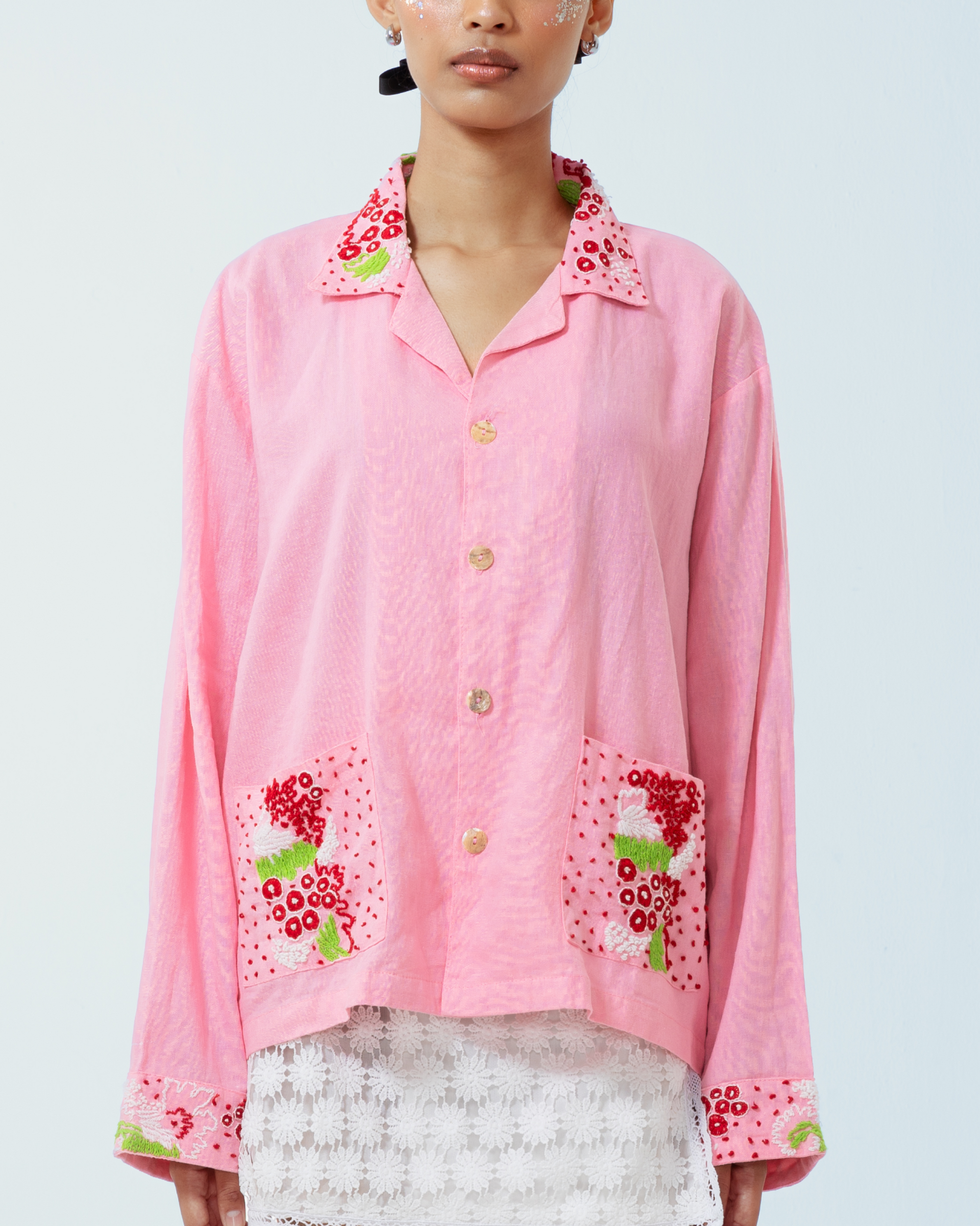 Image of Granada Jacket Pink, a shirt-jacket made from deadstock linen with a hand-embroidery detailing on the collar, pockets, and cuffs.