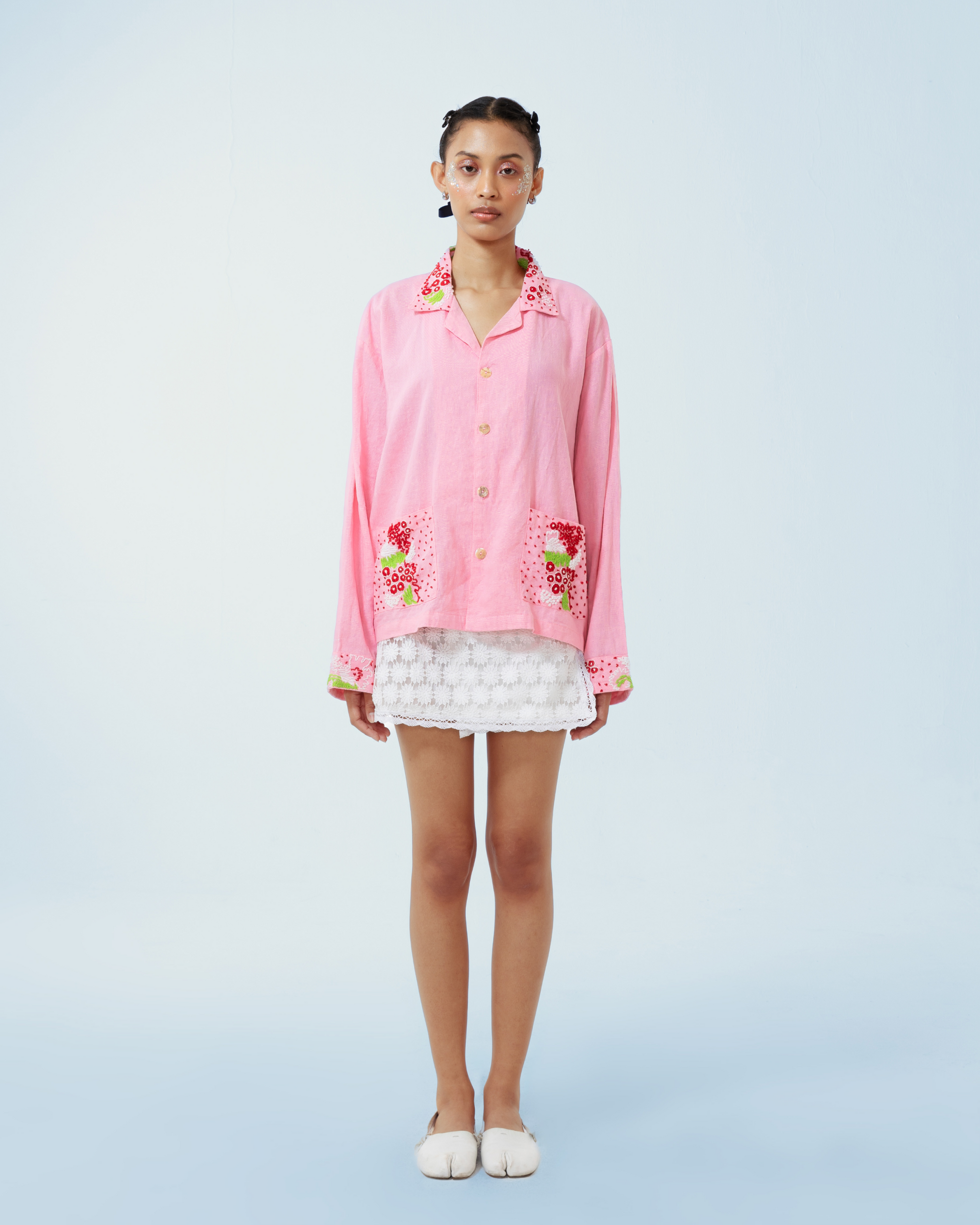 Image of Granada Jacket Pink, a shirt-jacket made from deadstock linen with a hand-embroidery detailing on the collar, pockets, and cuffs.