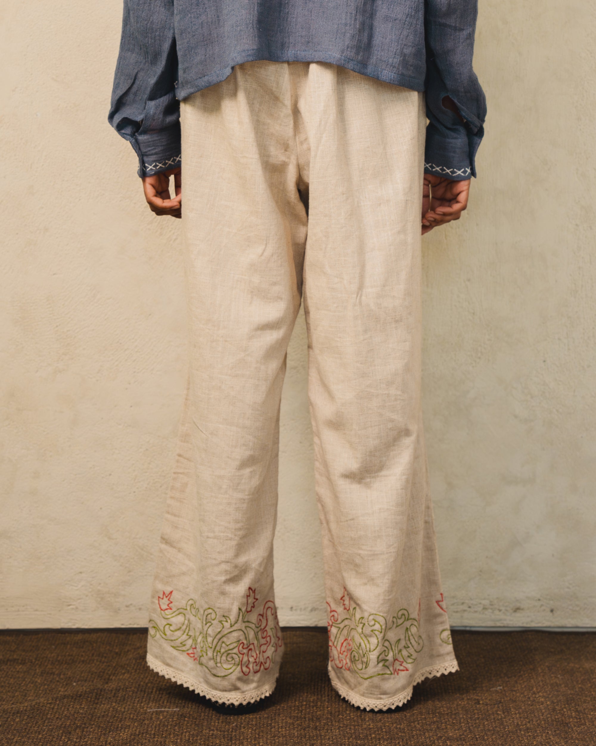 Image of Hansel Embroidery Pants Creme, wide-leg linen pants with adjustable drawstring waist.