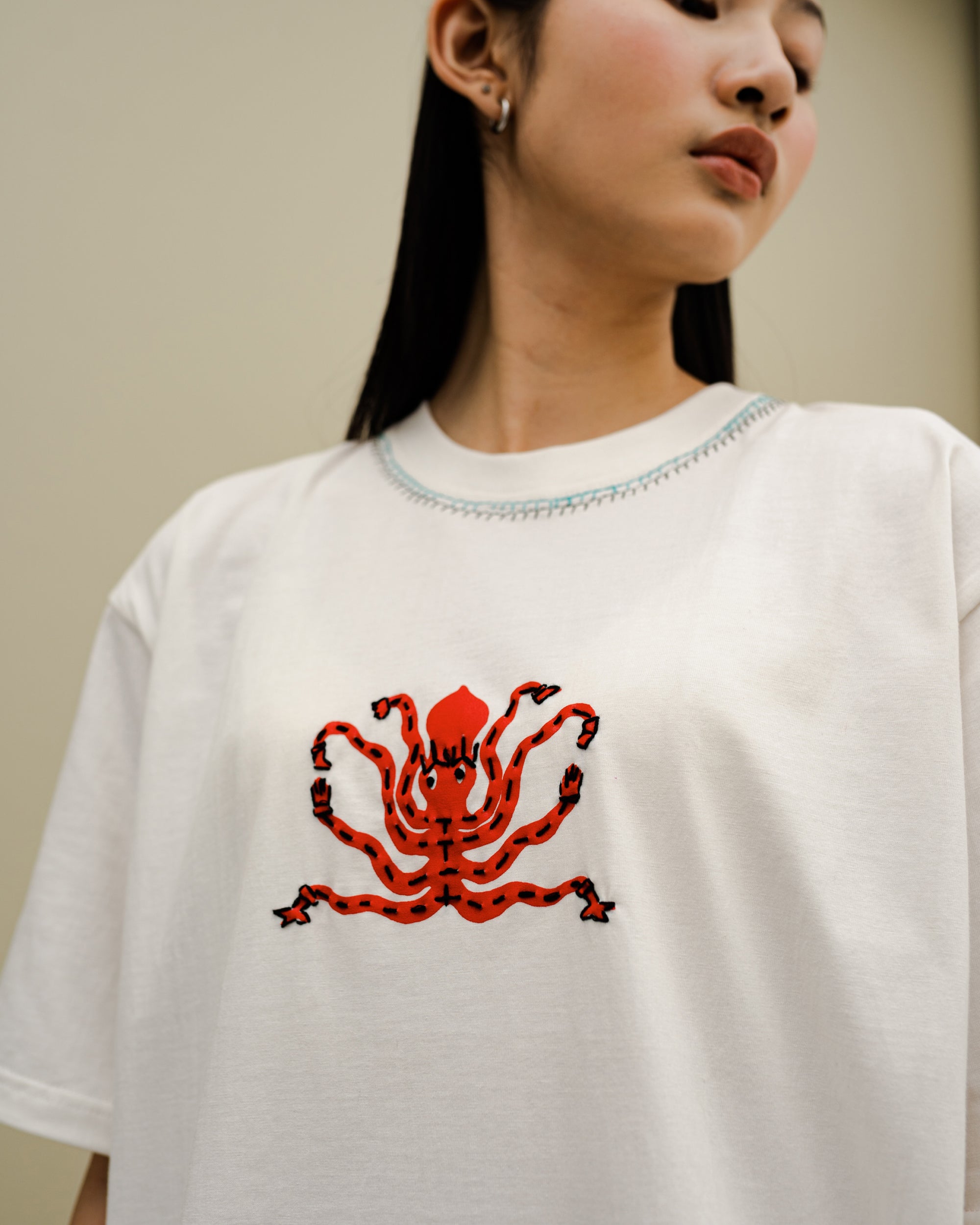 Image of Inka Octo Regular Tee, a tee with playful graphic and embroidery details.