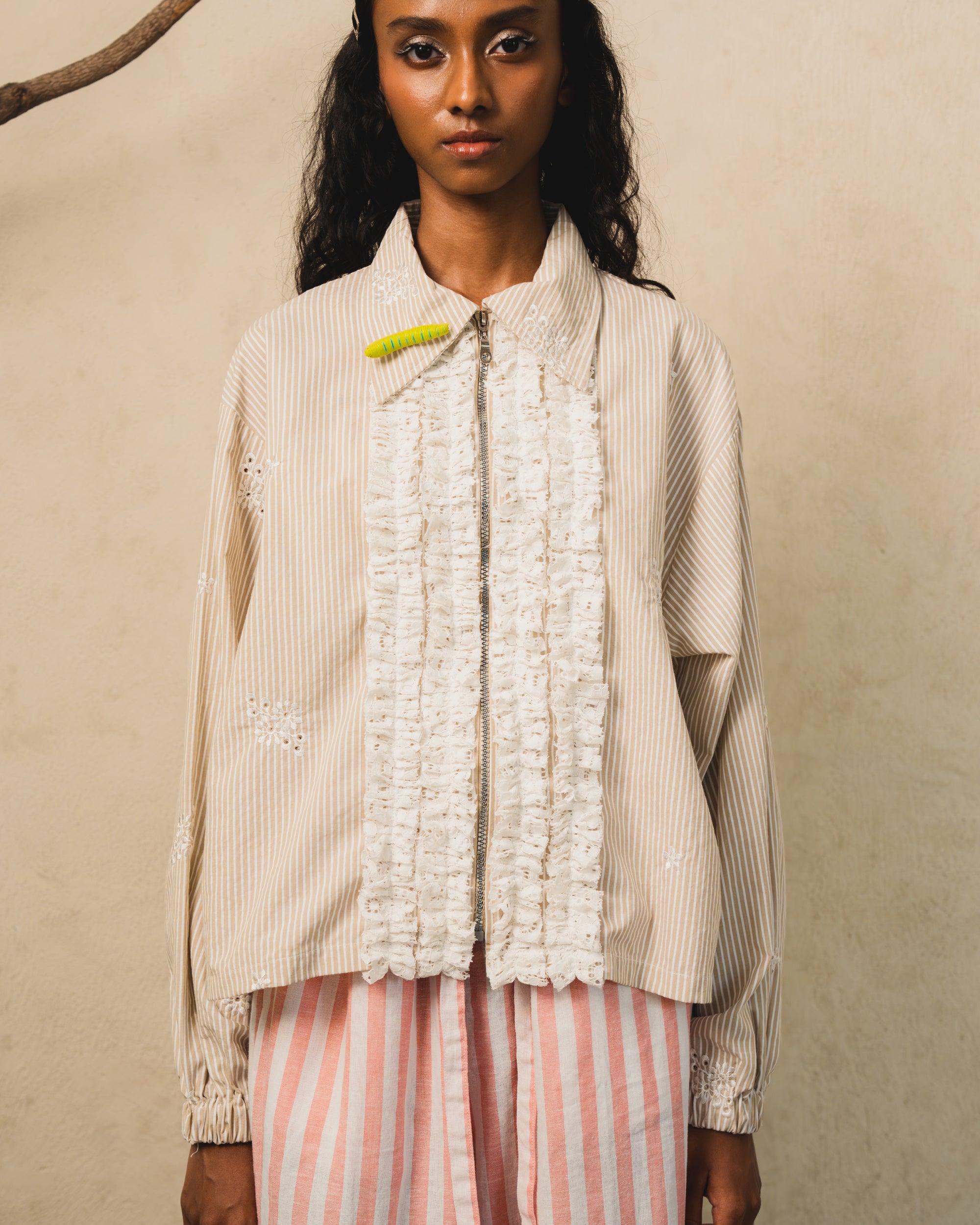 Image of Leila Ruffle Jacket Creme, a zip-up jacket made from linen, finished with ruffles on the front.