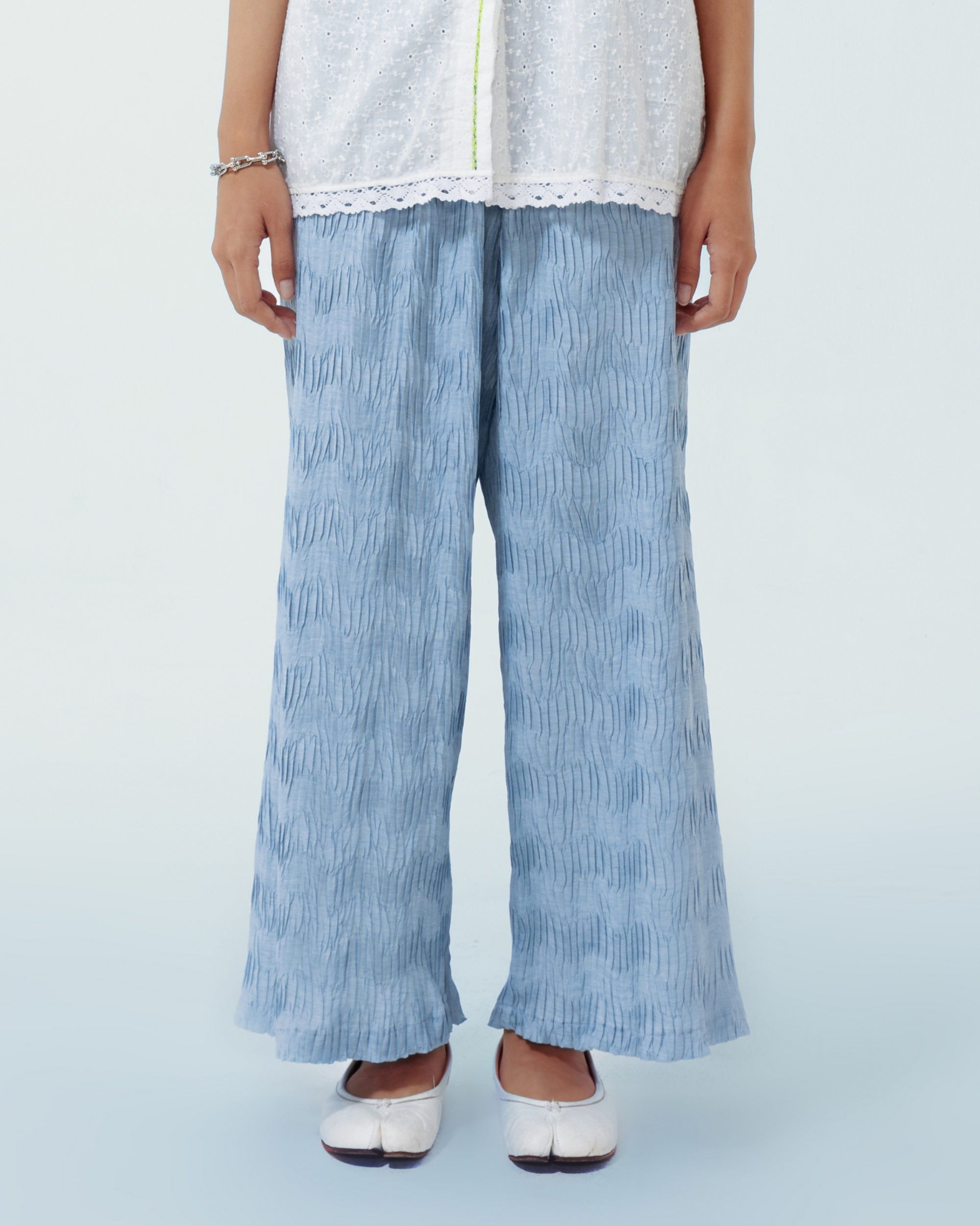 Image of Luis Pants Blue, a wide-leg pants made from pleated cotton.