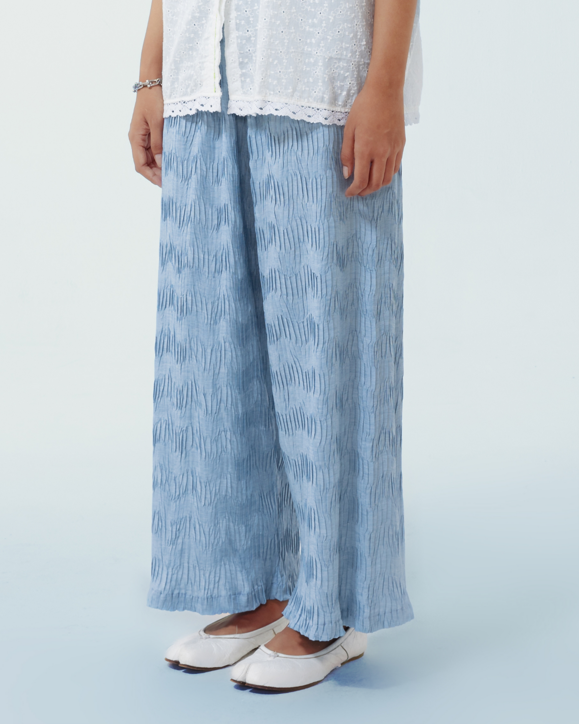 Image of Luis Pants Blue, a wide-leg pants made from pleated cotton.