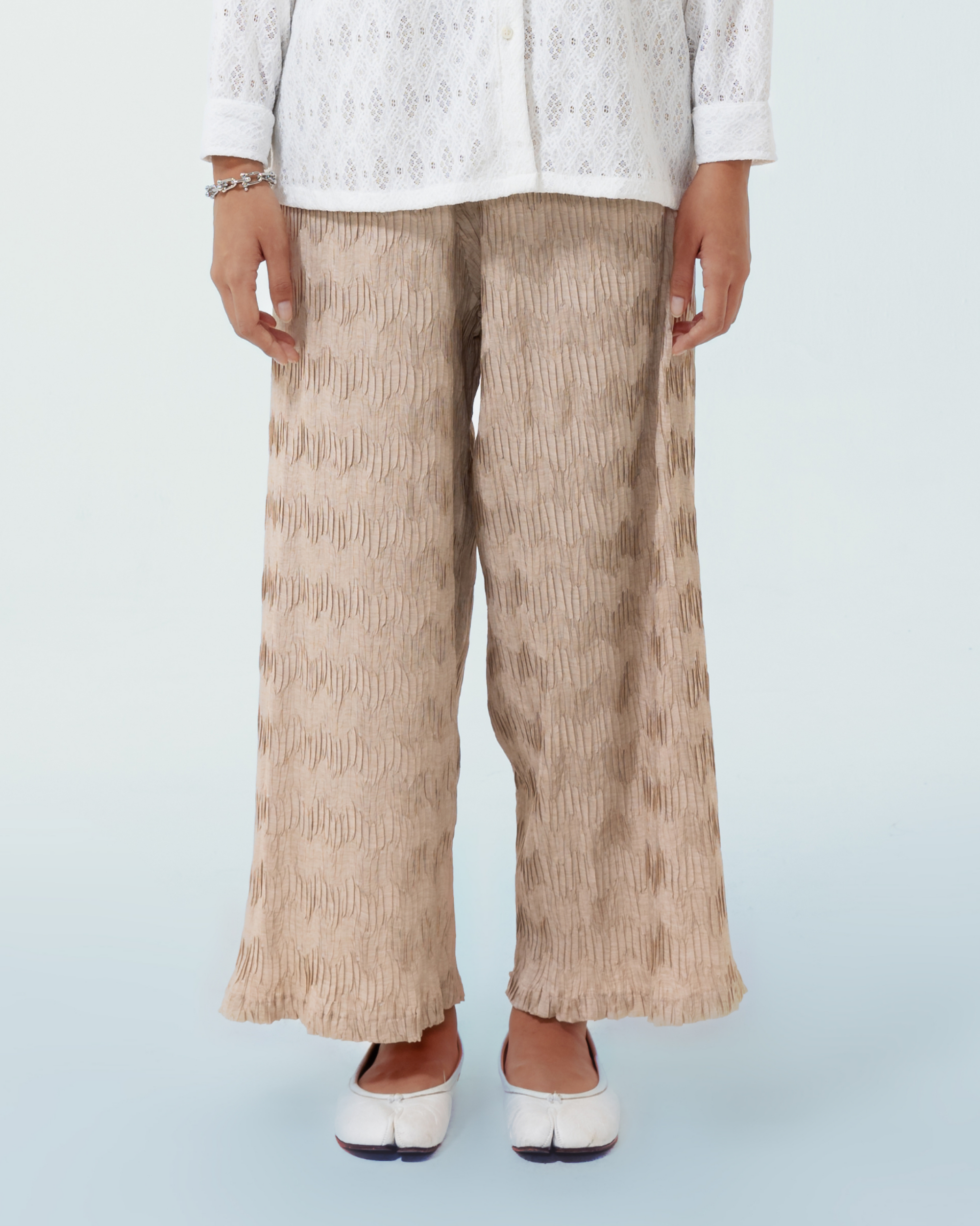 Image of Luis Pants Brown, a wide-leg pants made from pleated cotton.