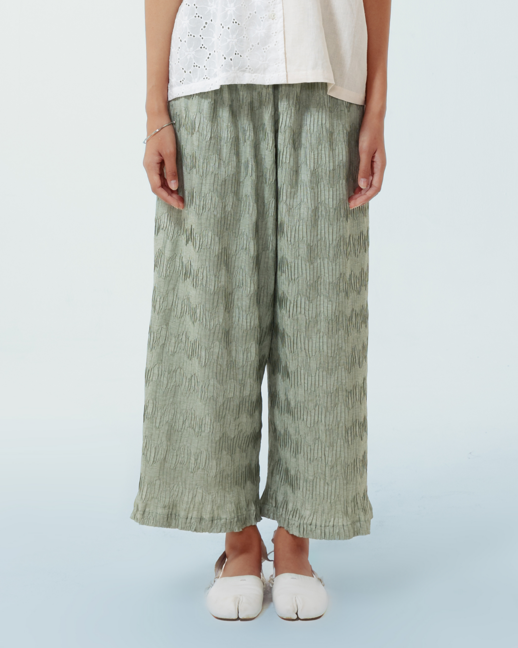 Image of Luis Pants Green, a wide-leg pants made from pleated cotton.