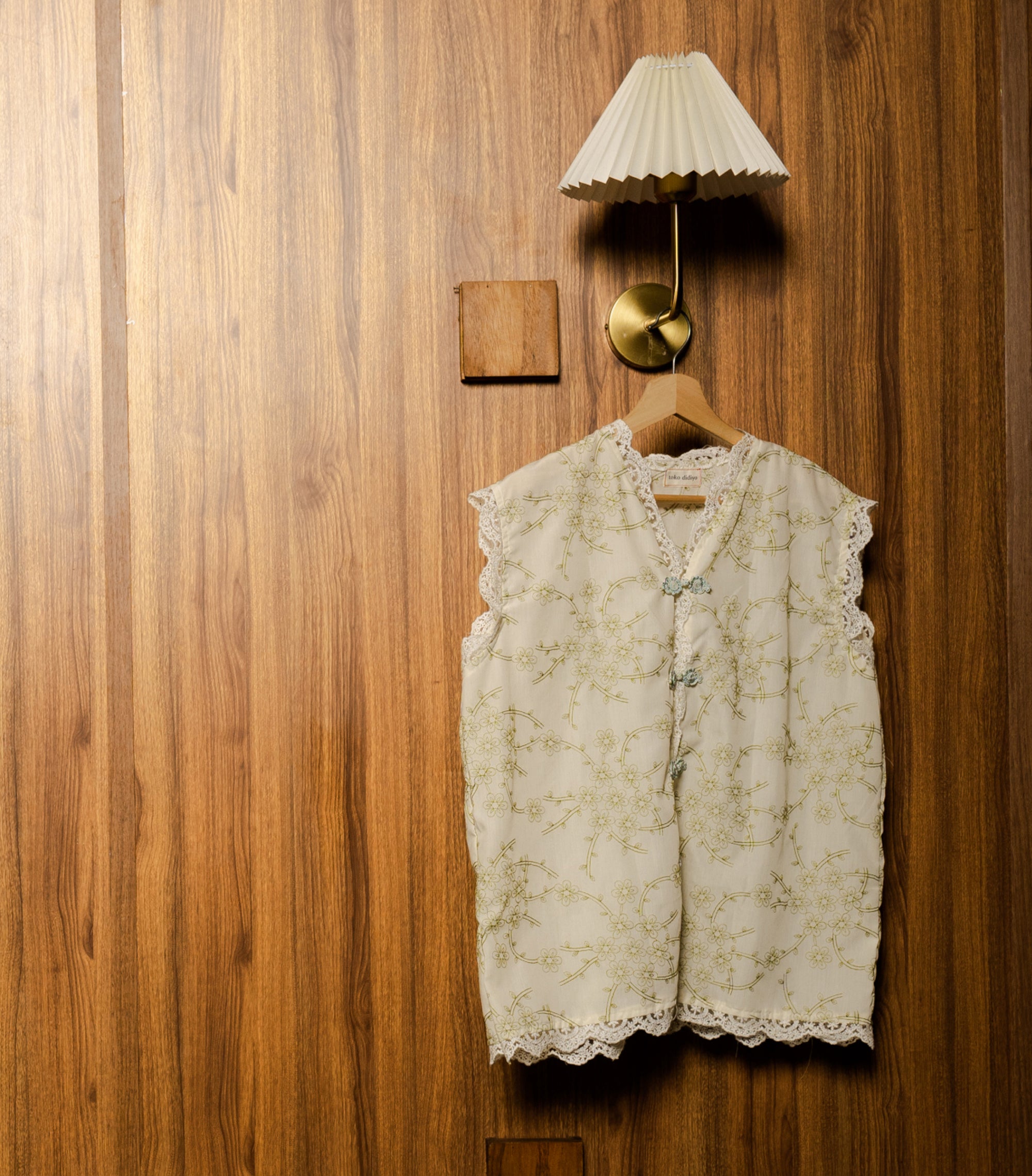 Image of Lunar Embroidery Vest Green, a sleeveless top made from embroidered cotton.