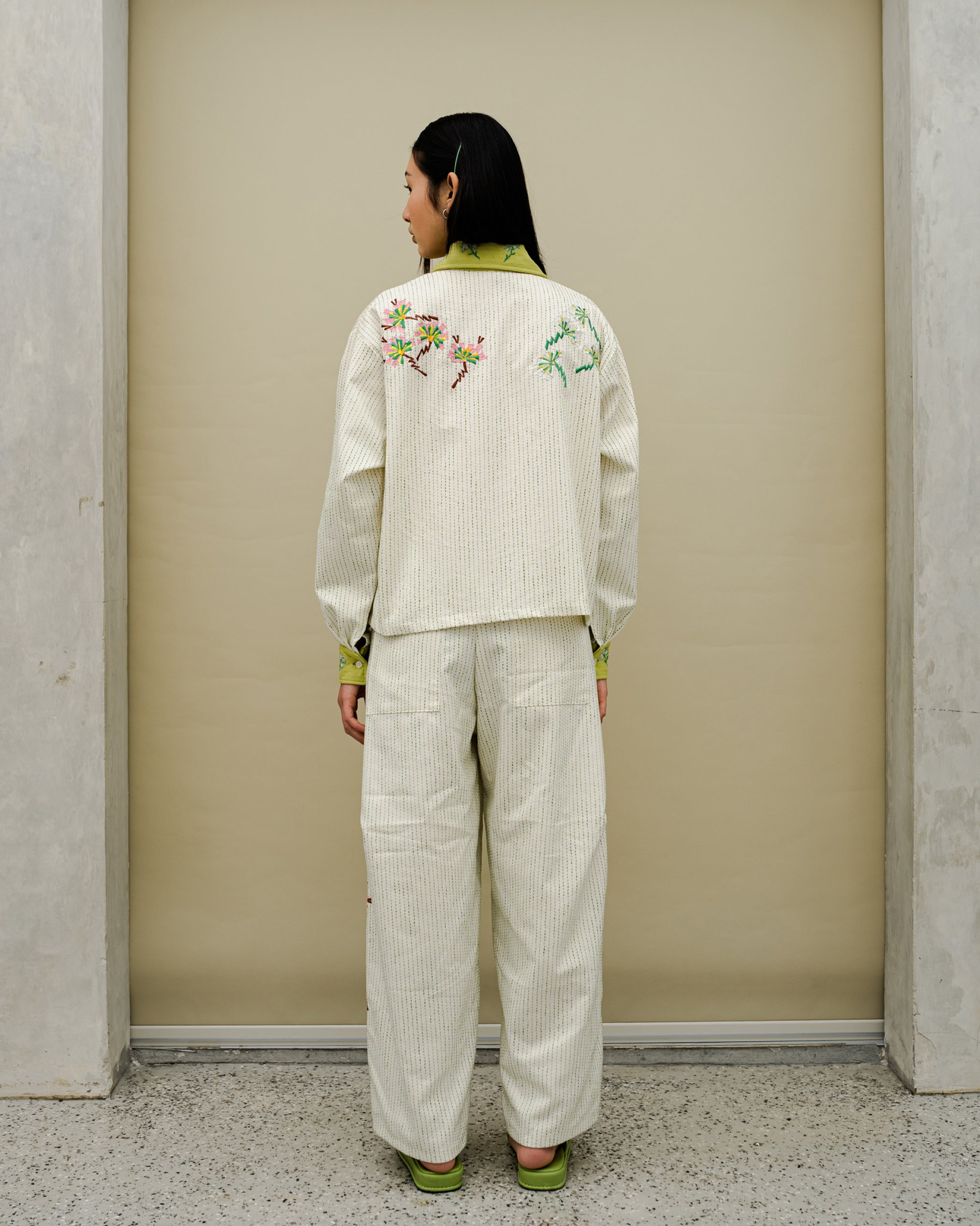 Image of Orla Embroidery Denim Jacket Crème, a zip-up denim jacket with floral embroidery.