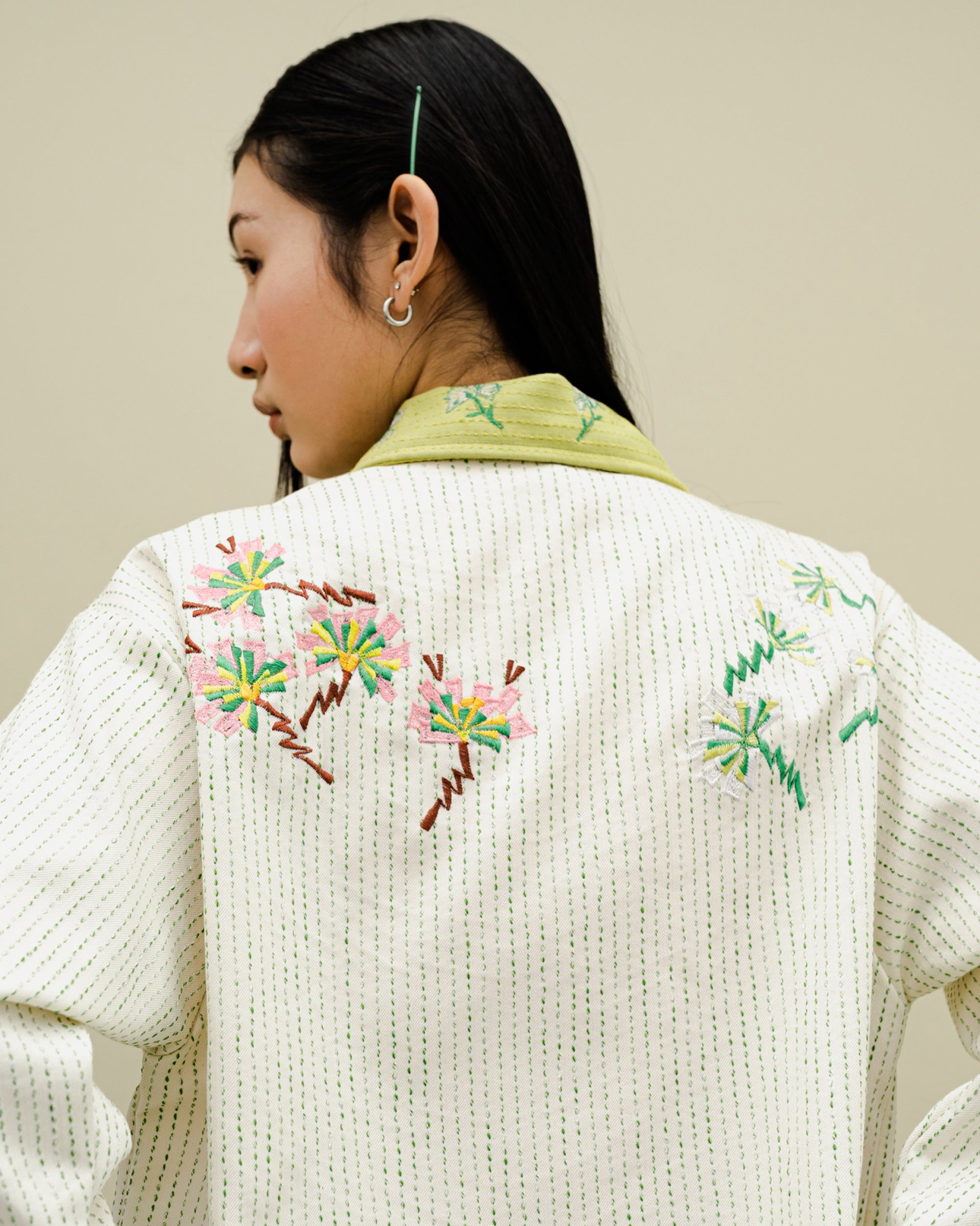 Image of Orla Embroidery Denim Jacket Crème, a zip-up denim jacket with floral embroidery.